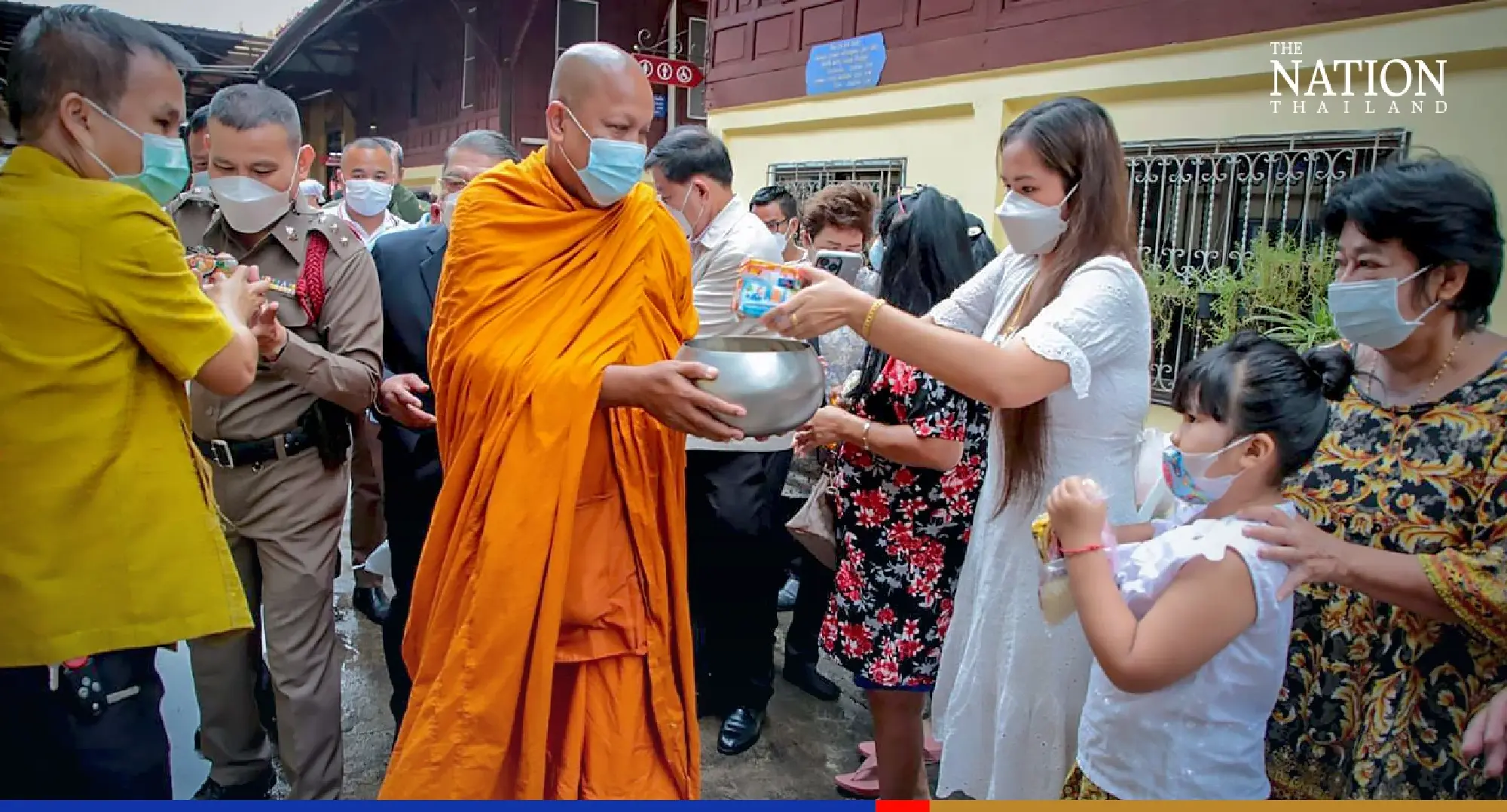 Devout Buddhists flock to temples to give alms as monks mark end of Lent