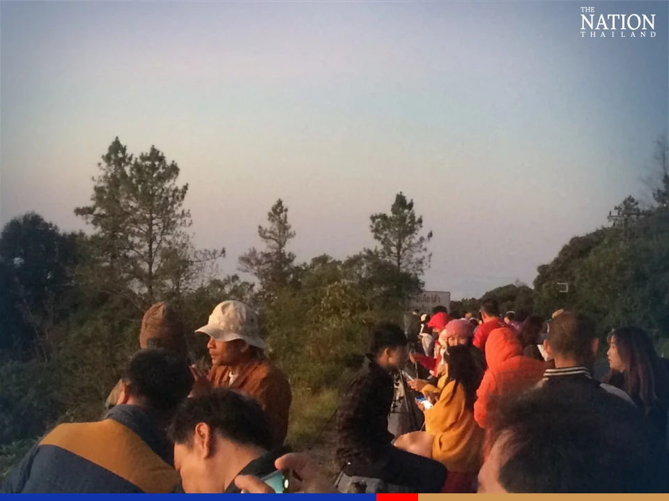Tourists enjoy first sign of frost atop Doi Inthanon this year