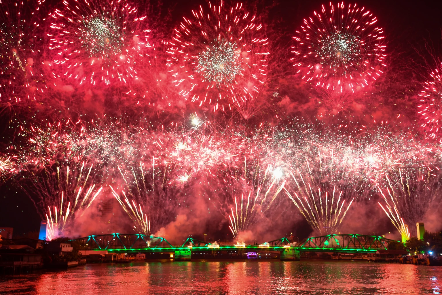 Fireworks explode along the Chao Phraya river ahead of the APEC Summit 2022 which will be held in Bangkok, Thailand