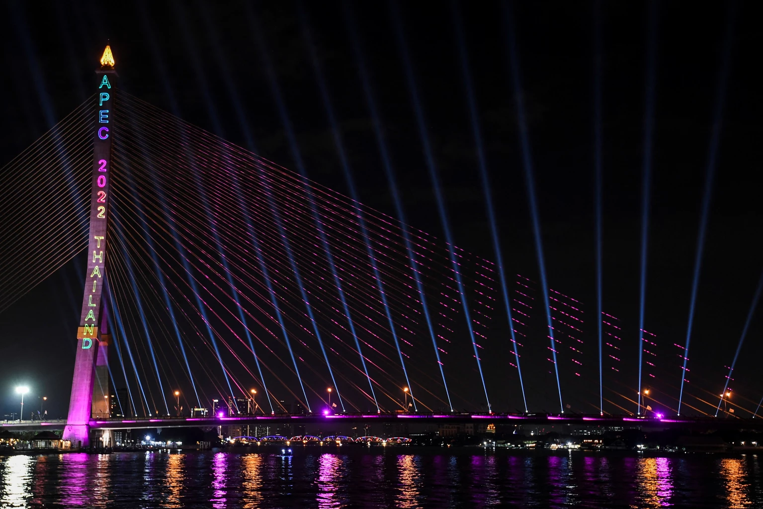 Rama VIII bridge along the Chao Phraya river is illuminated ahead of the APEC Summit 2022 which will be held in Bangkok, Thailand
