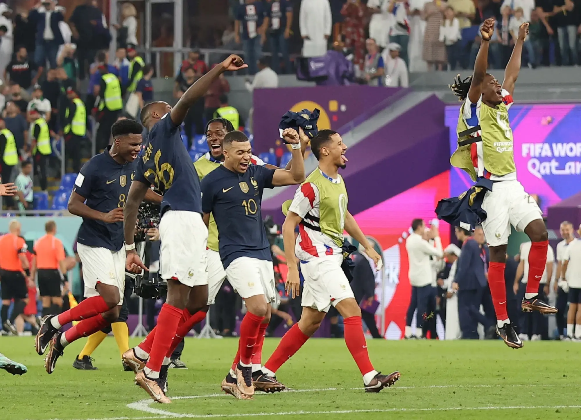 France's Kylian Mbappe and teammates celebrate after the match 