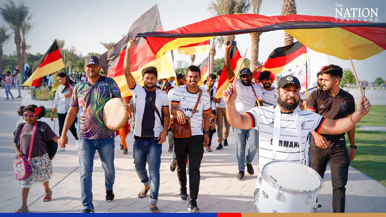 Germany fans march towards the Count Down Clock