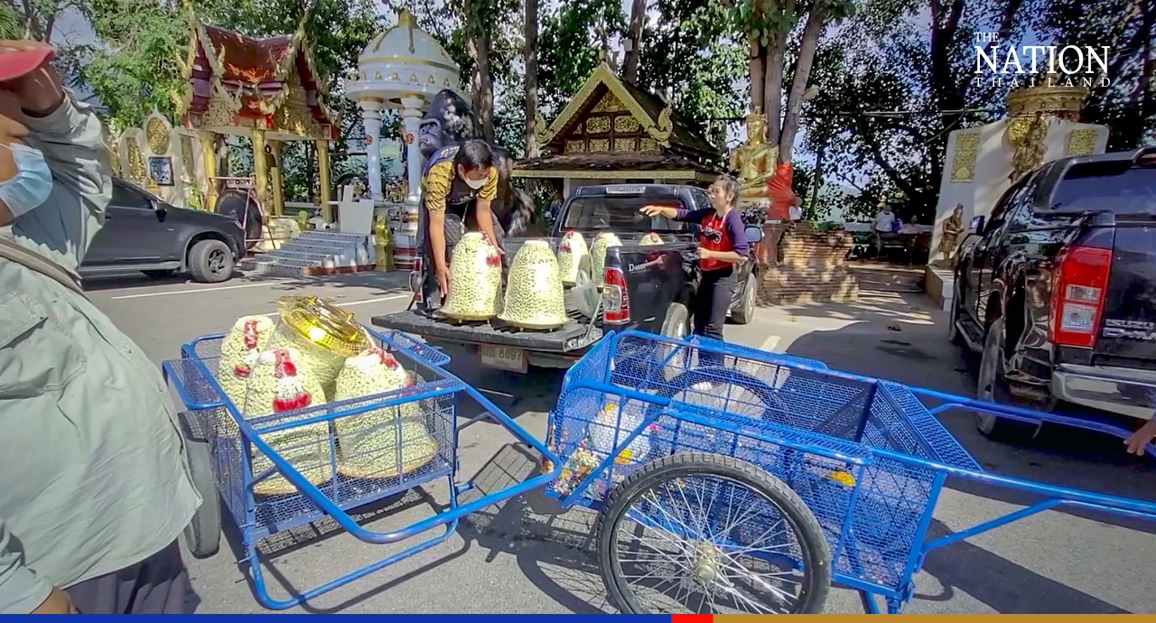Devotee showers 429,000 garlands on Buddha idol in Chiang Mai to fulfil vow