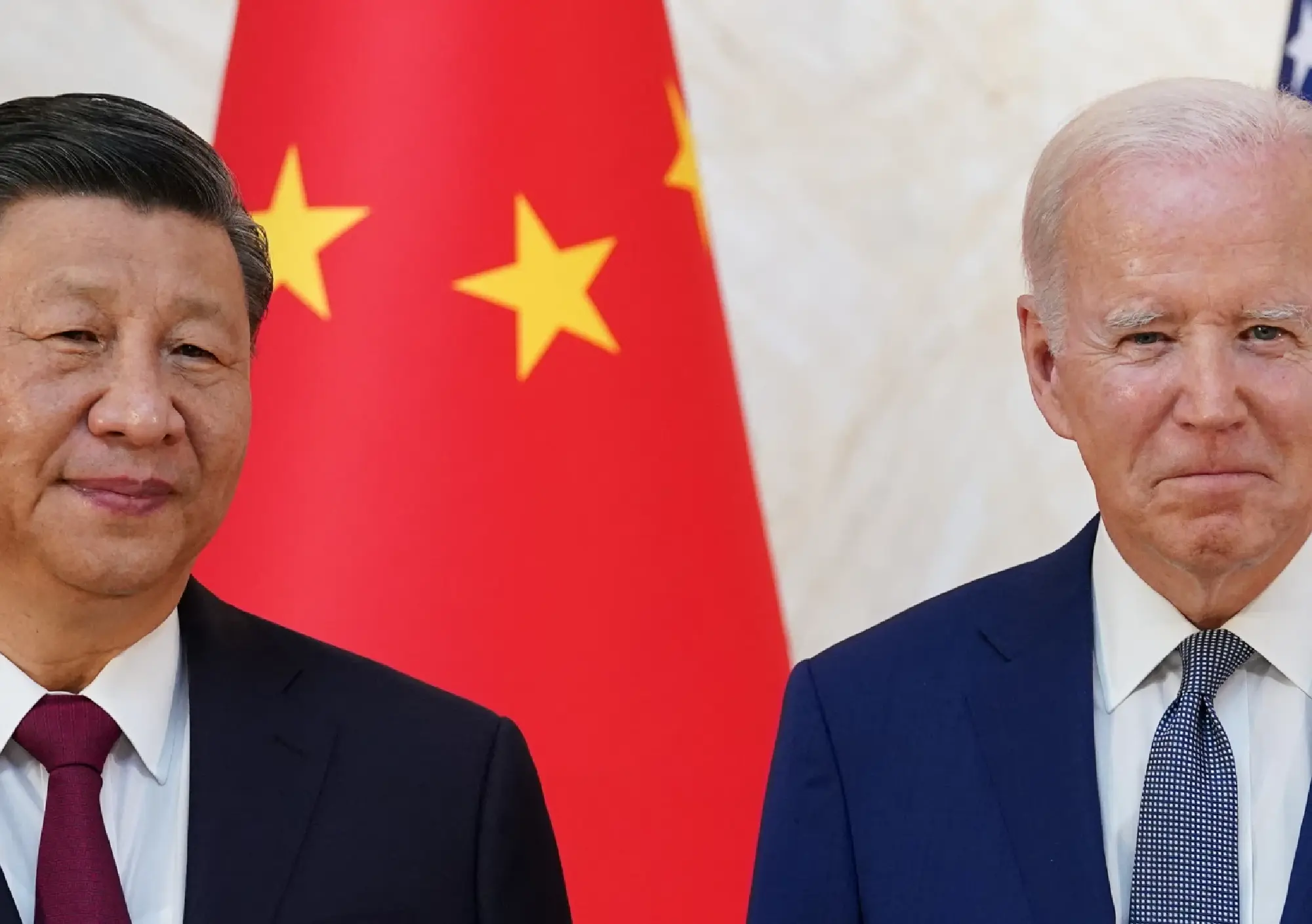 Xi, Biden pledge to continue candid exchange of views