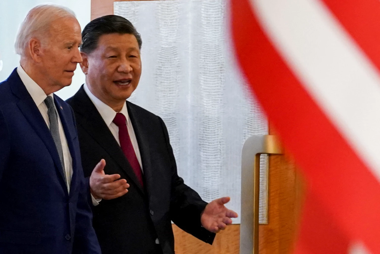 Xi, Biden pledge to continue candid exchange of views