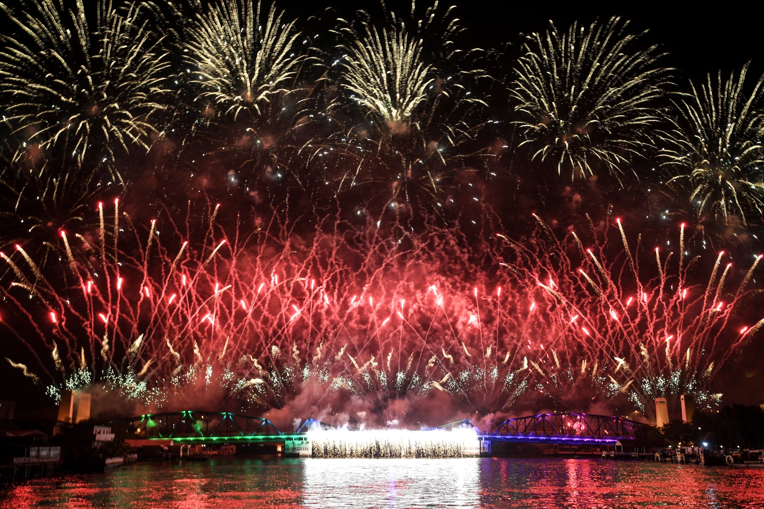 Fireworks explode along the Chao Phraya river ahead of the APEC Summit 2022 which will be held in Bangkok, Thailand