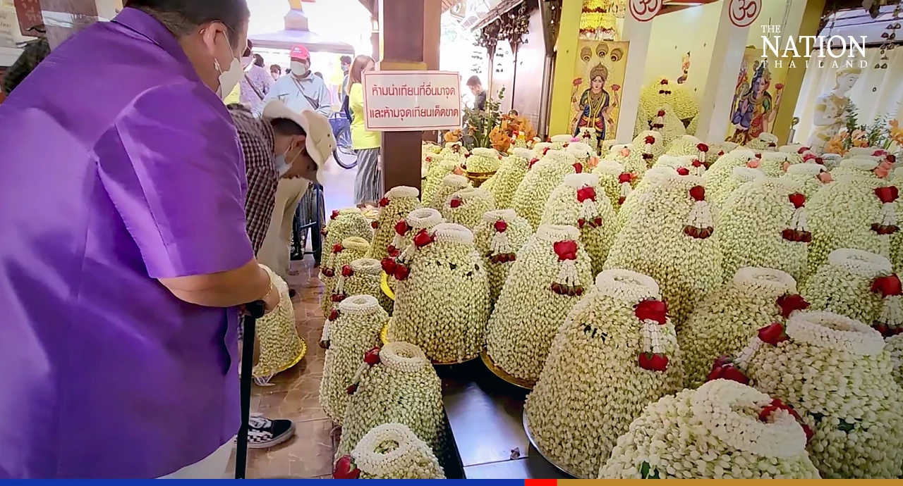 Devotee showers 429,000 garlands on Buddha idol in Chiang Mai to fulfil vow