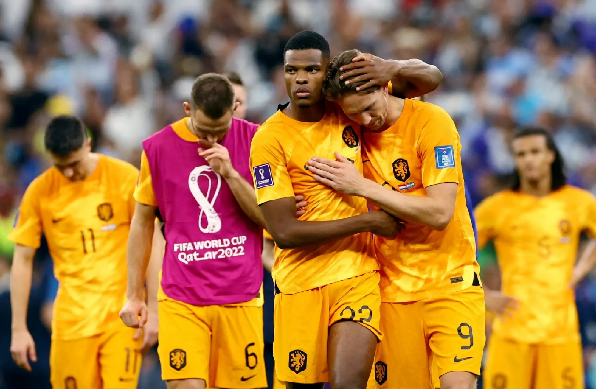 Netherlands' Denzel Dumfries and Luuk de Jong look dejected after being eliminated from the World Cup 
