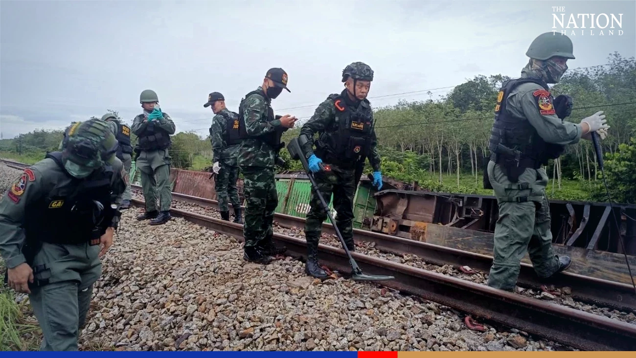After second blast, bomb disposal officers scour area near derailed train