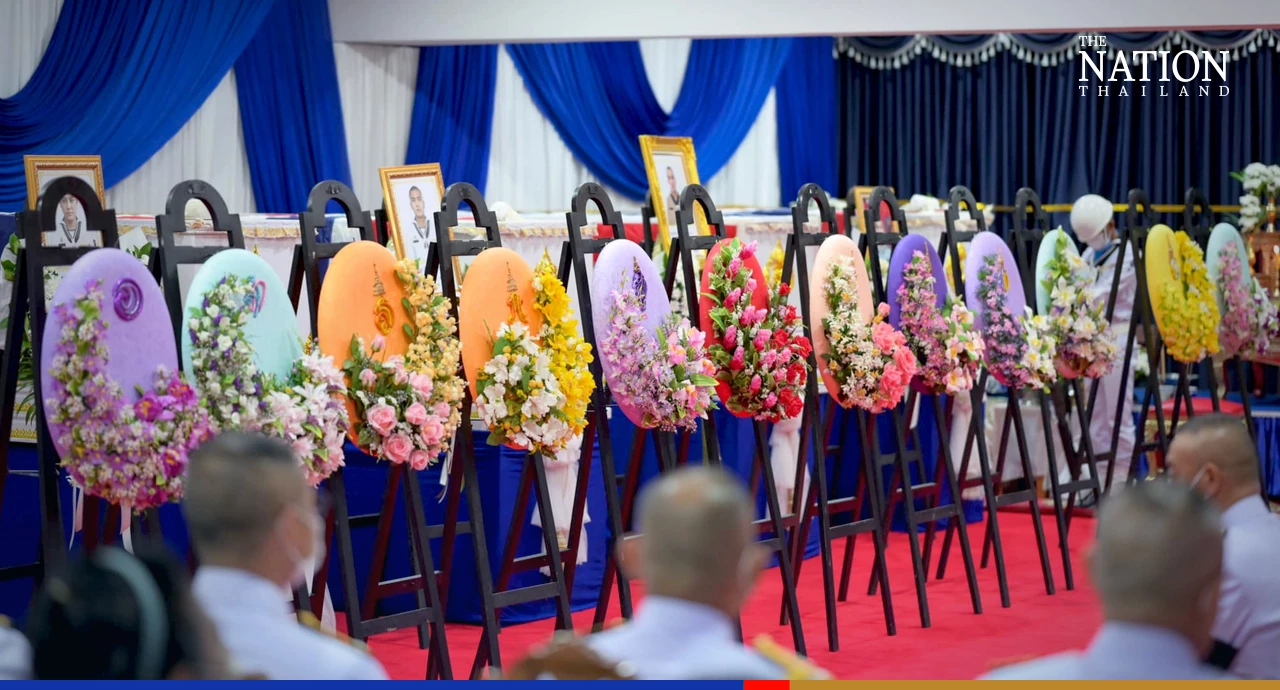 Navy chief expresses sorrow at funerals as search resumes for missing crew