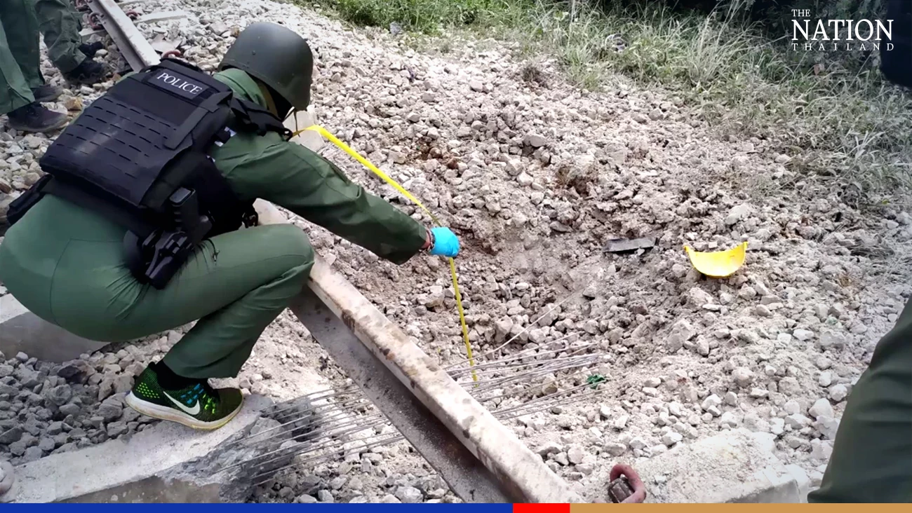 After second blast, bomb disposal officers scour area near derailed train