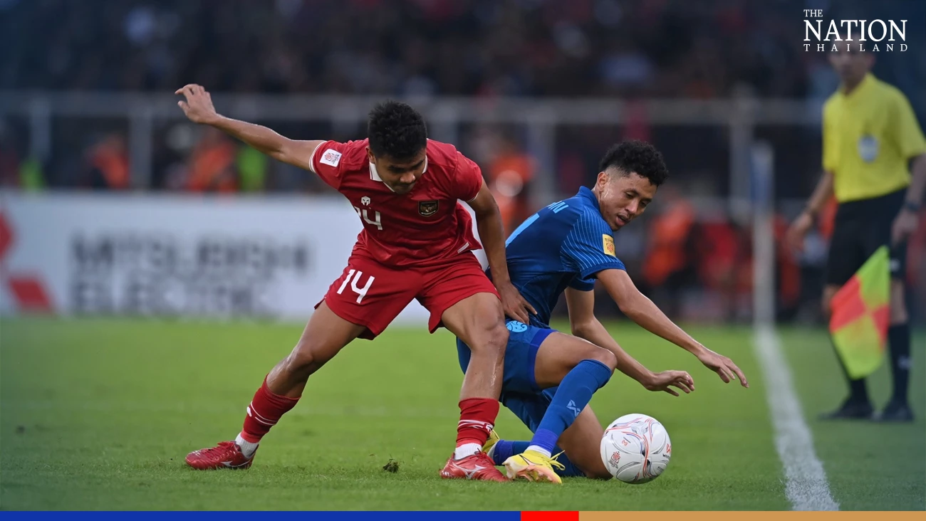 Ten-man Thailand salvage draw against Indonesia to stay top of group
