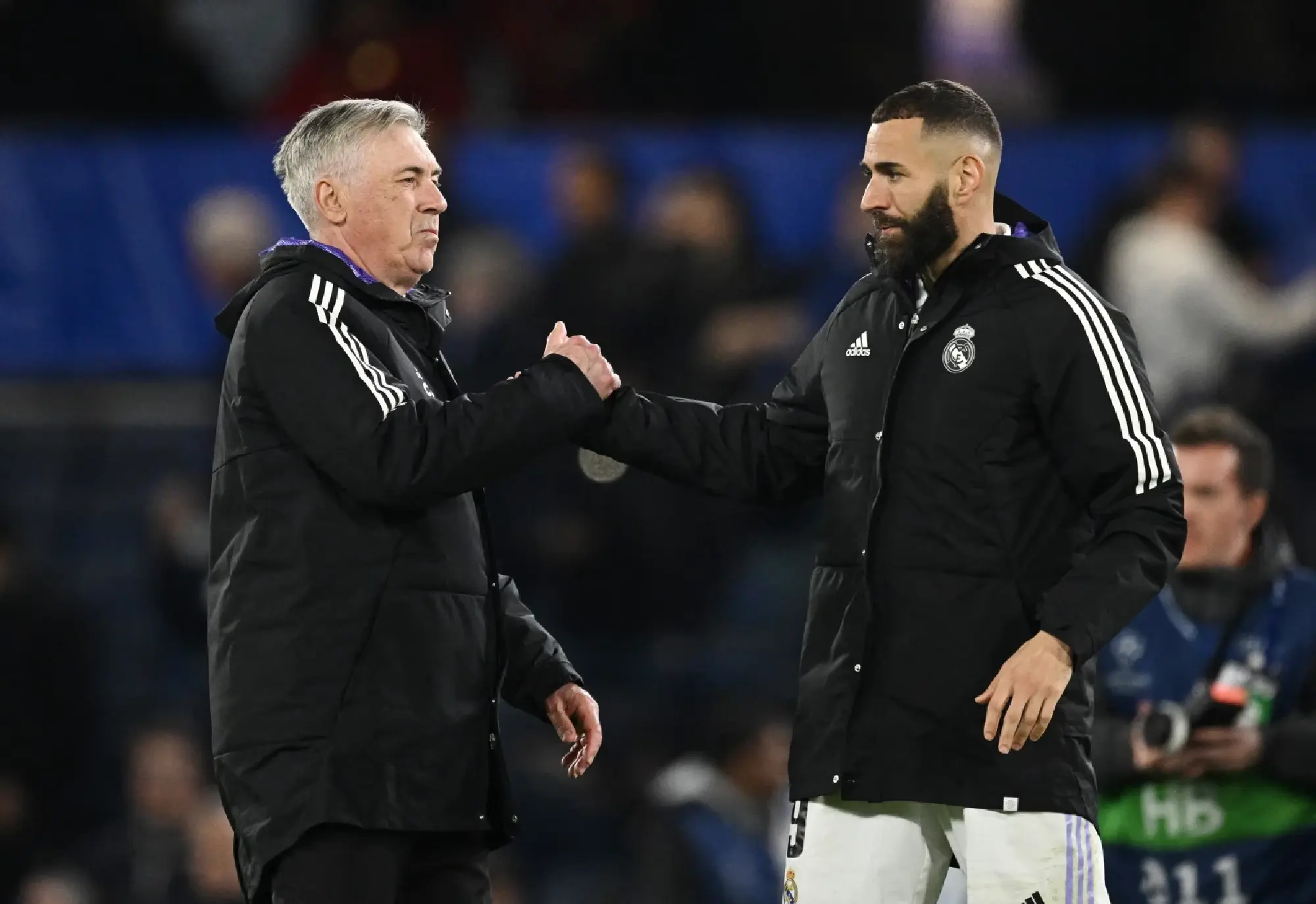 Real Madrid coach Carlo Ancelotti and Karim Benzema celebrate after the match