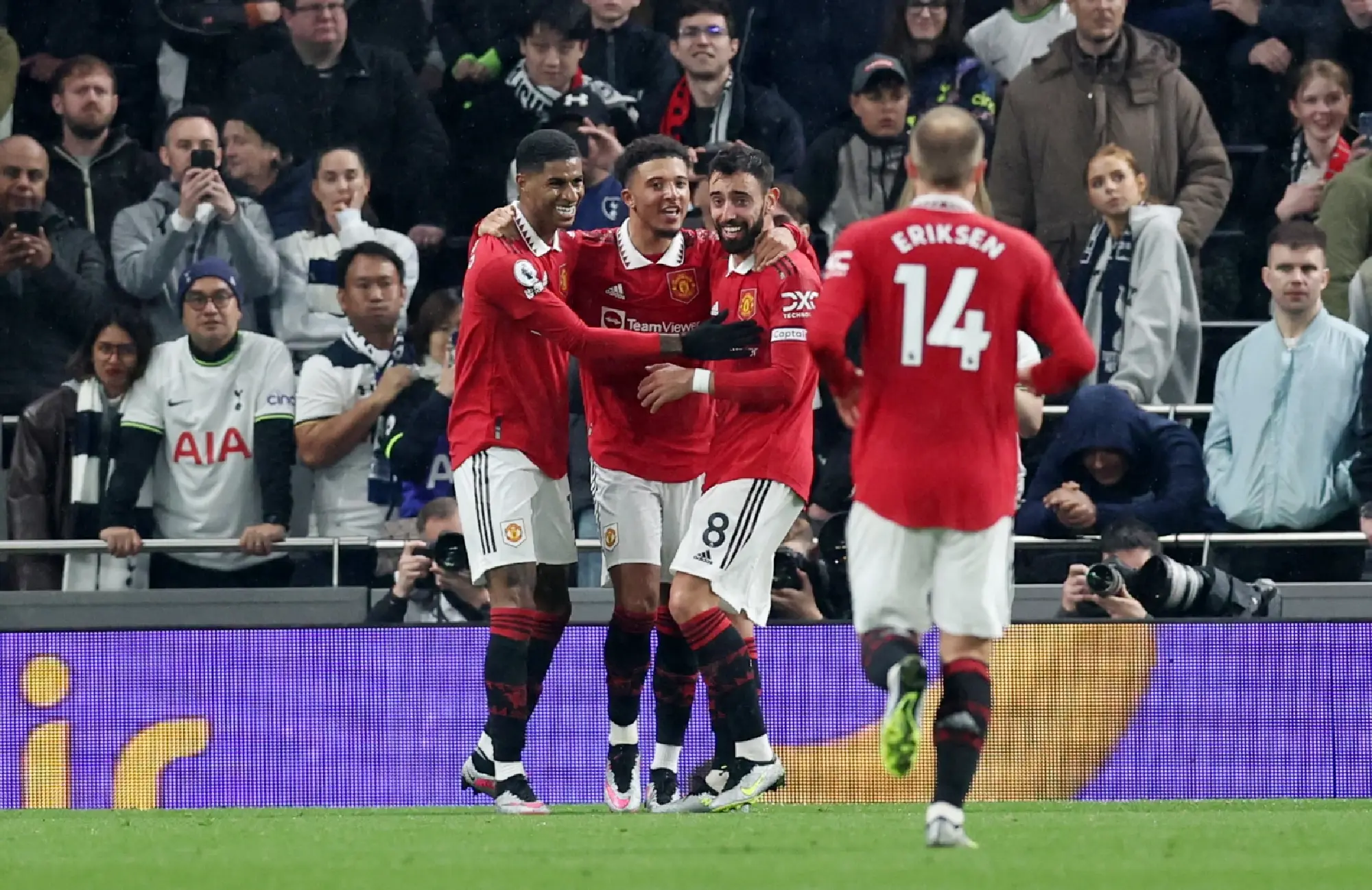 Manchester United\'s Marcus Rashford celebrates scoring their second goal with Jadon Sancho and Bruno Fernandes