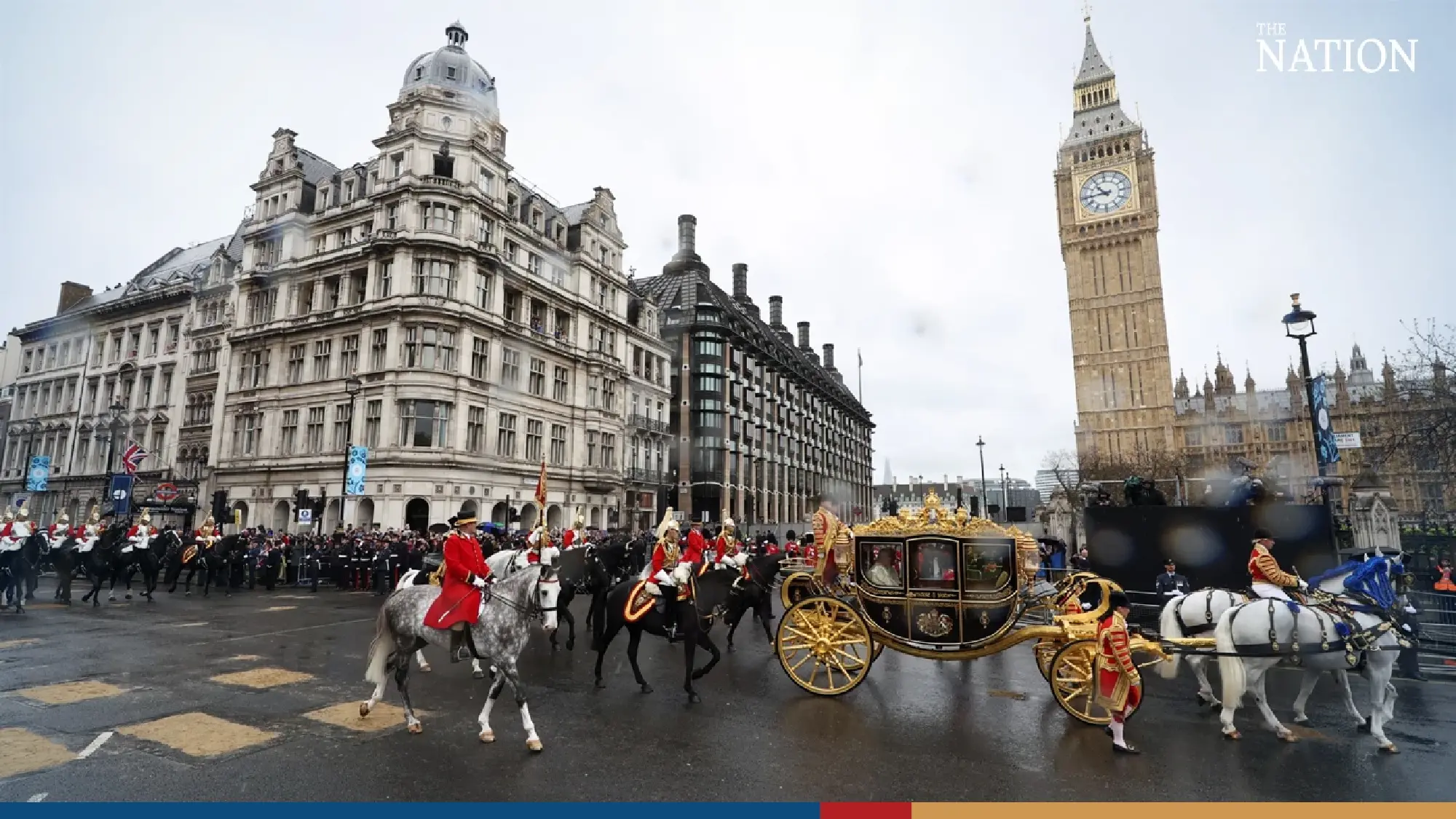 King Charles and Queen Camilla sit in Diamond Jubilee State Coach in front of Big Ben in Westminster on the day of coronation in London, Britain 