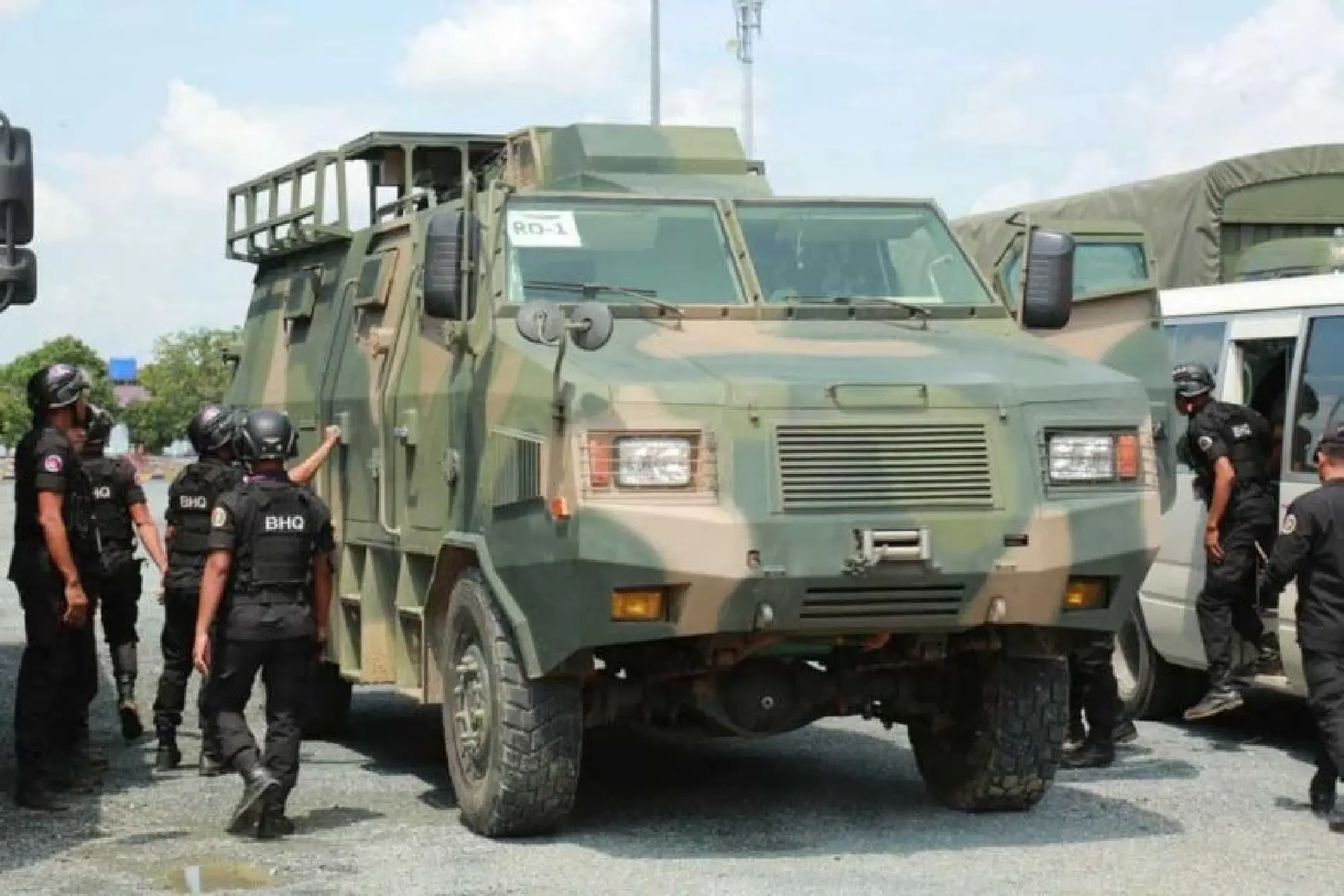 Armoured vehicles prepare to leave Takhmao headquarters for the northeastern borders on June 27. TVK