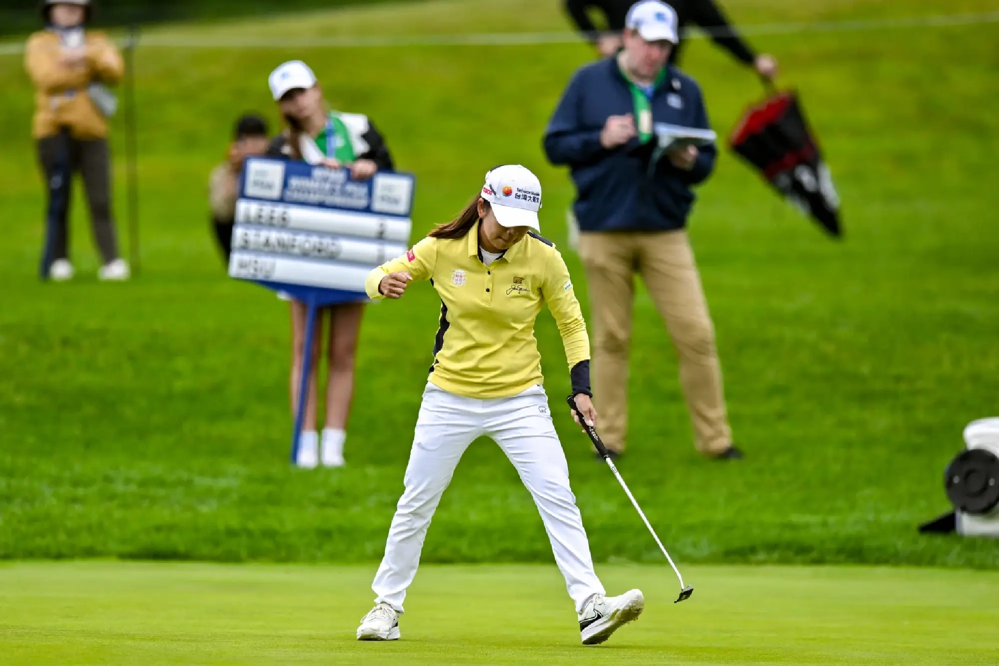 Wei Ling Hsu reacts after making a putt on the 4th green during the first round of the KPMG Women's PGA Championship golf tournament