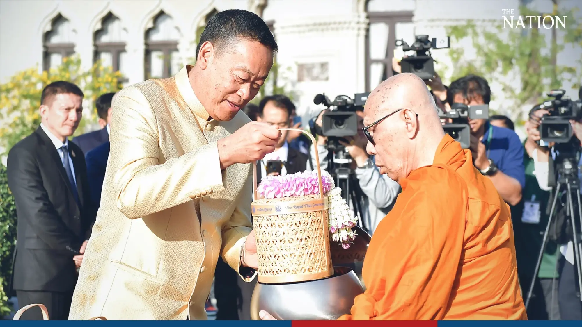 PM leads cabinet in merit-making ceremony at Government House