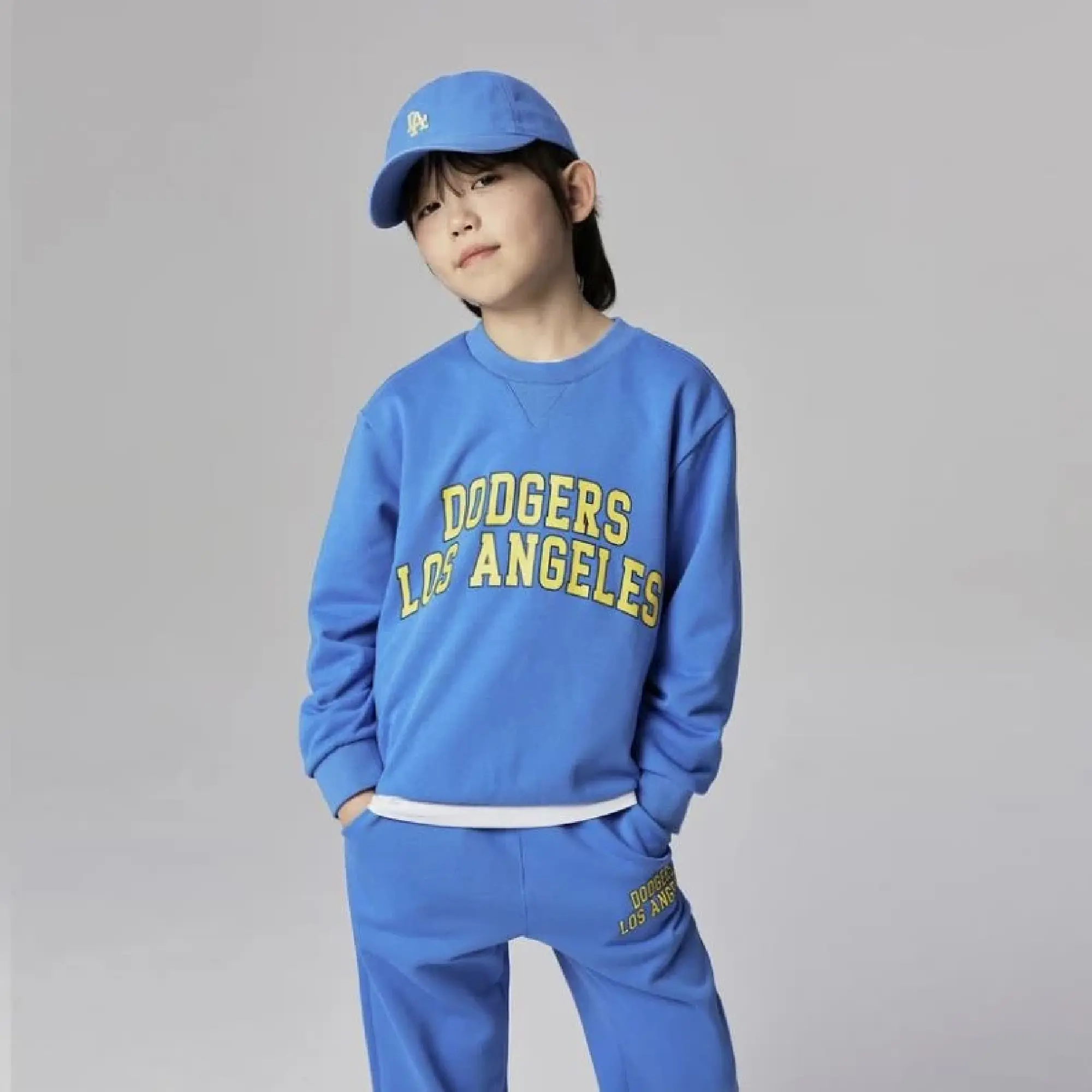 A child model in Los Angeles Dodgers apparel from MLB Kids brand (F&amp;F)