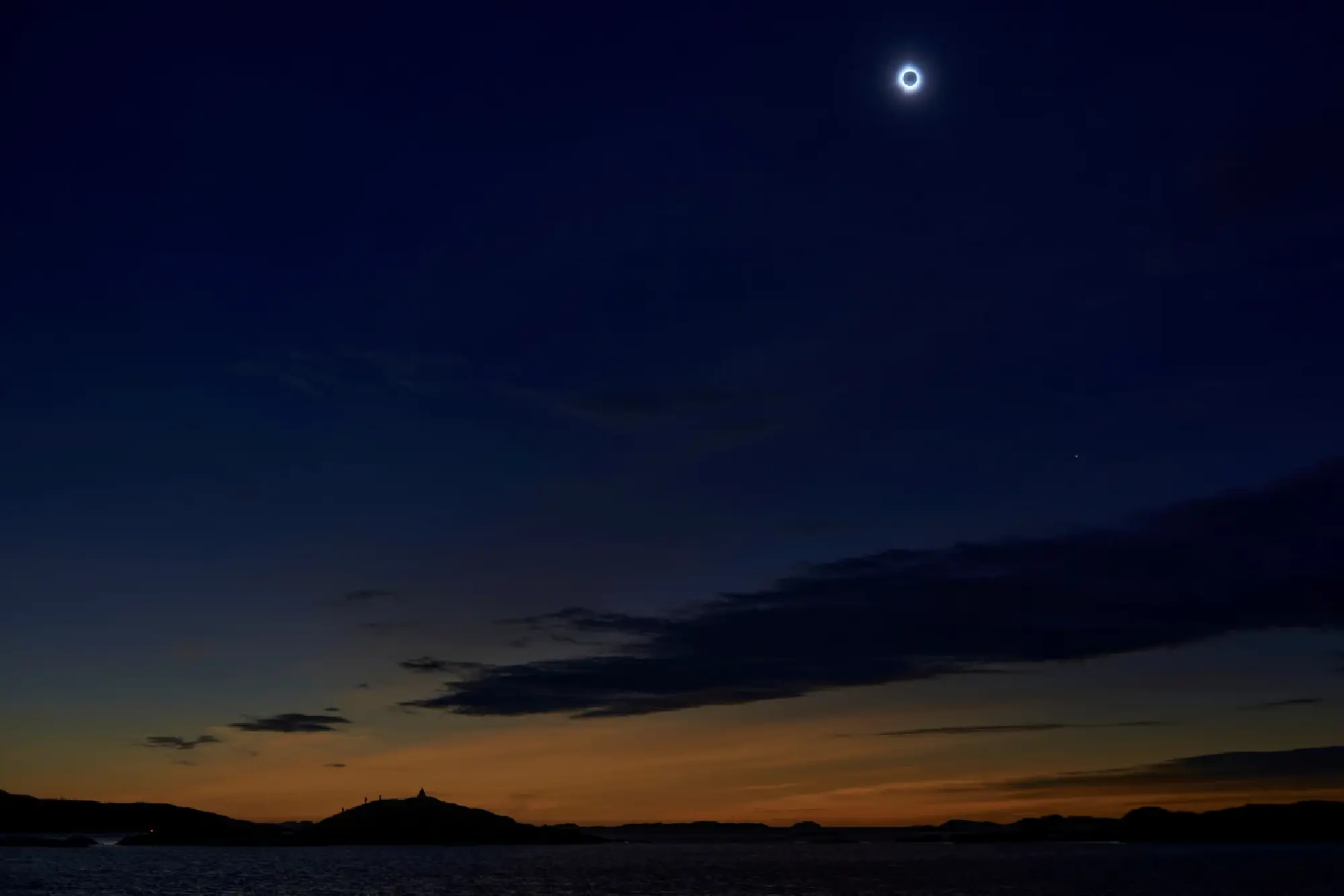 Clouds part just in time for total solar eclipse to wow North America