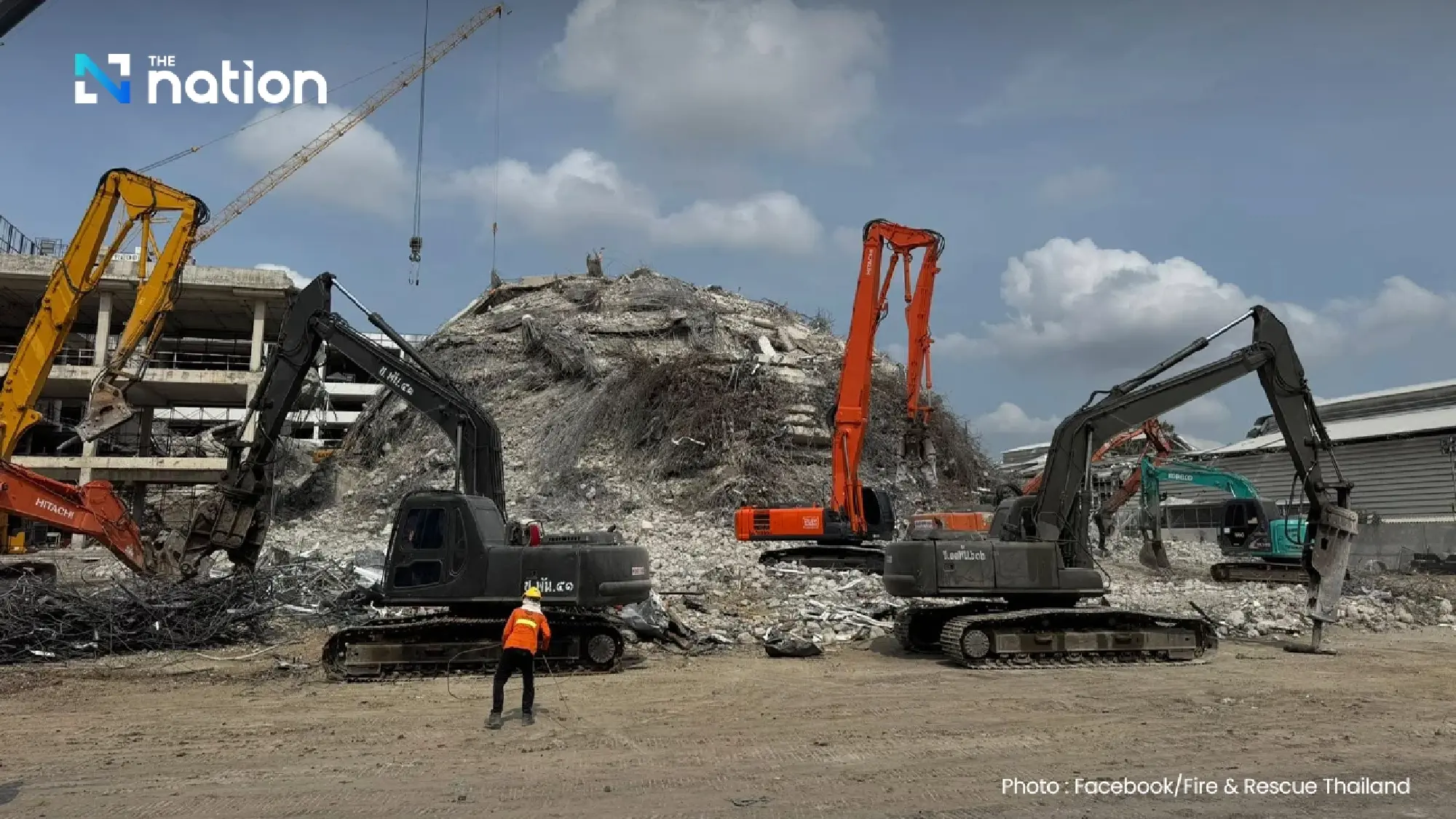 Two more workers' bodies found in collapsed building, more expected tonight