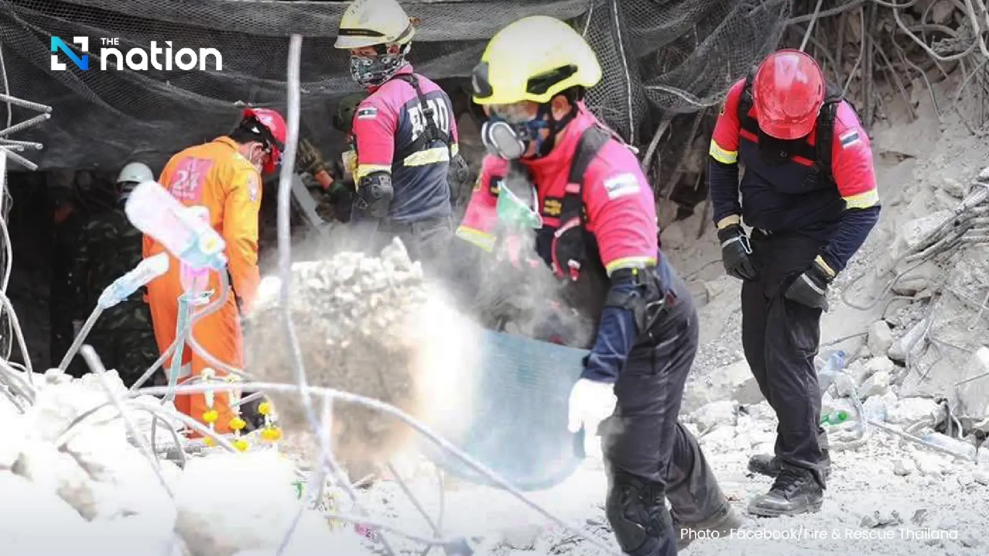 Two more workers' bodies found in collapsed building, more expected tonight