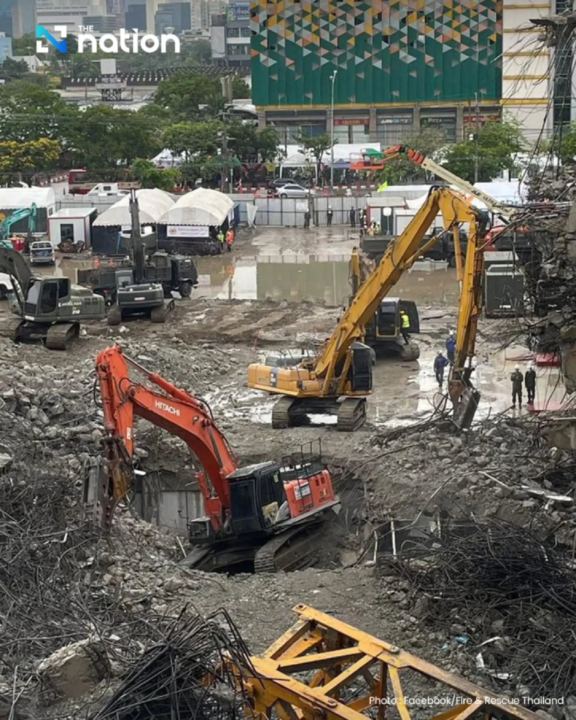 Giant Digger Joins Desperate Search for Survivors in Bangkok Building Collapse