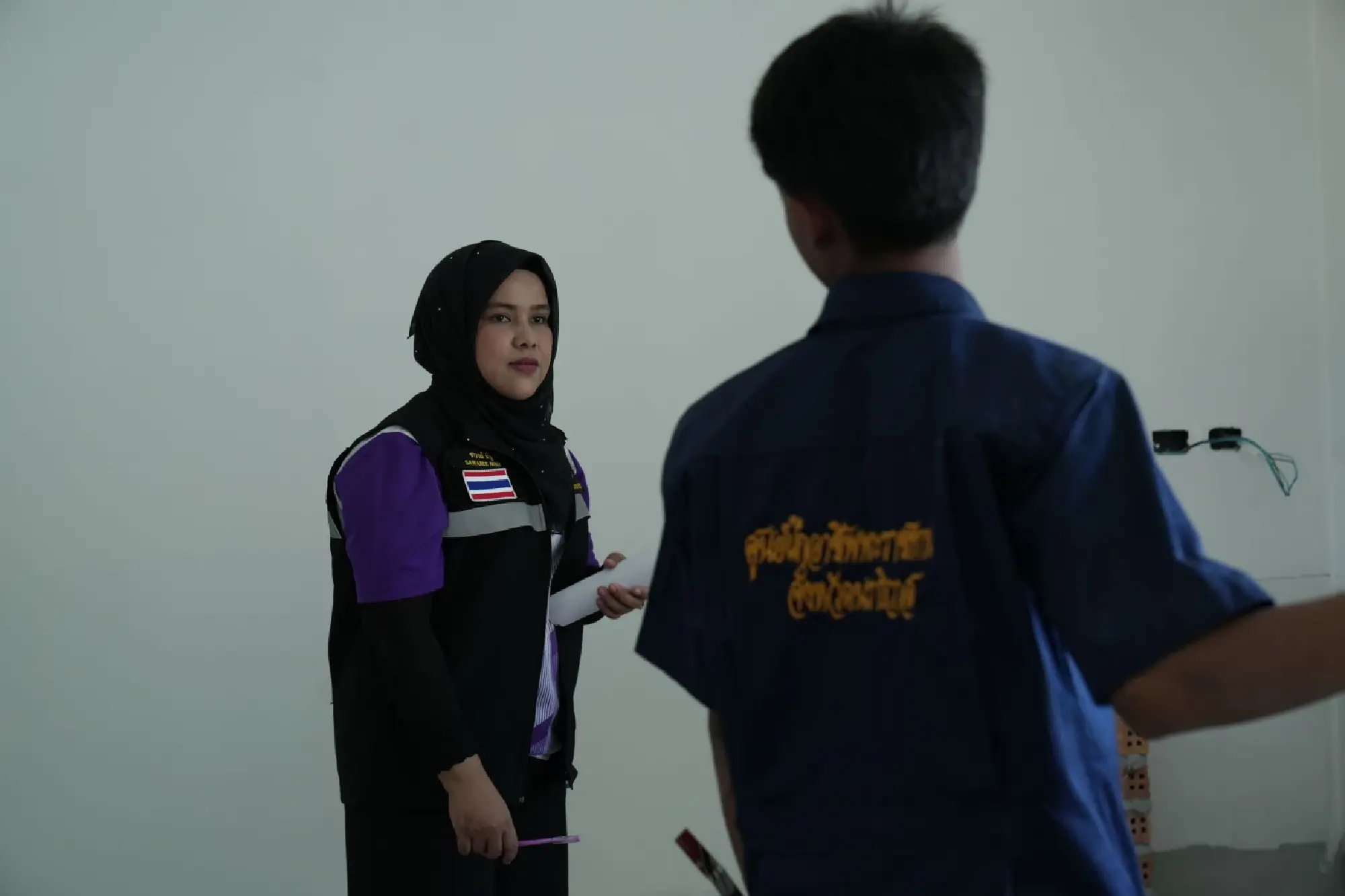 Labour graduate Sawanee Nibu visits Muhammadiman and Muhammadridwan during their internship in Muang Narathiwat Province.