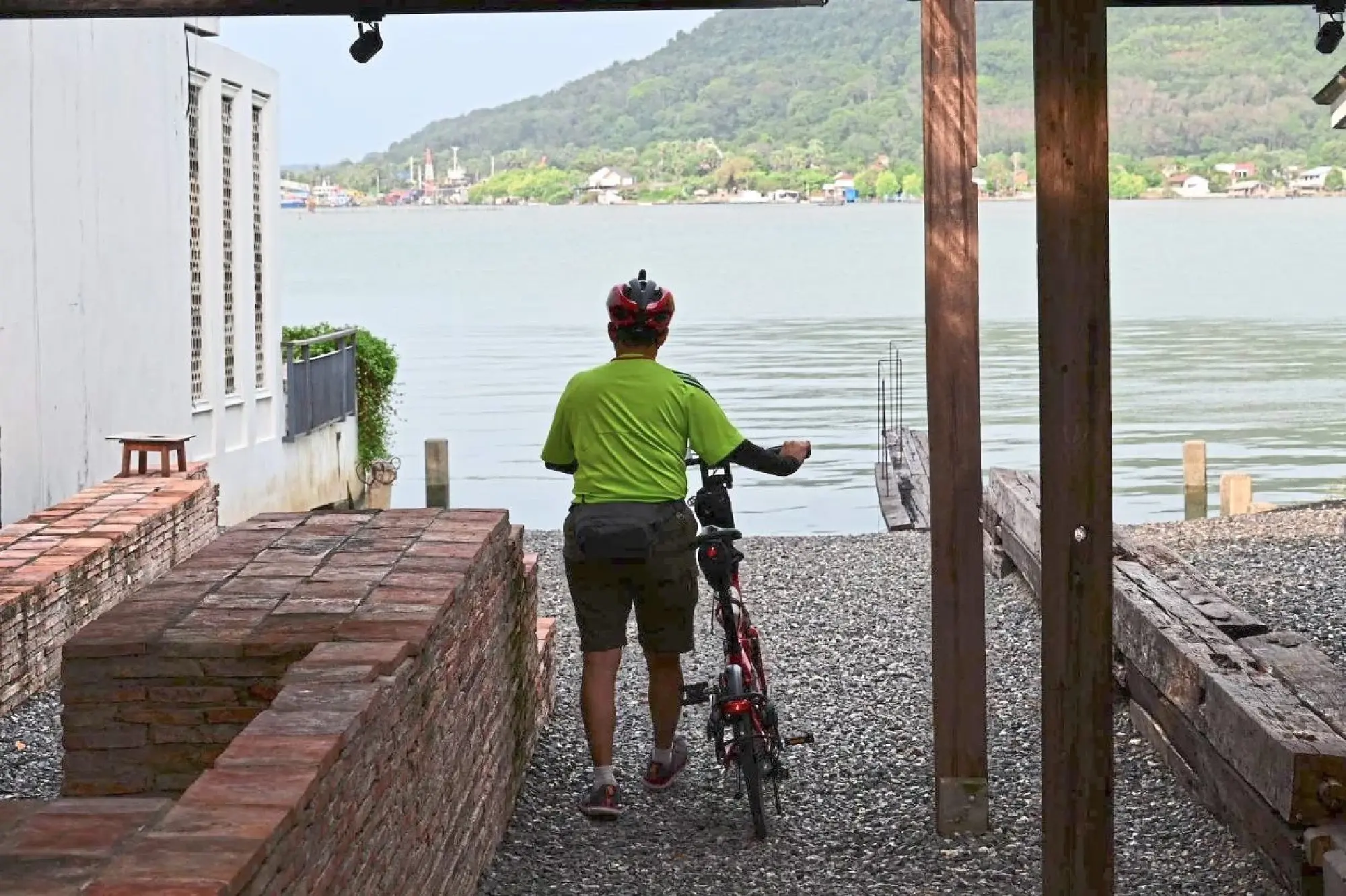 Standing at an overlook before Lake Songkhla.