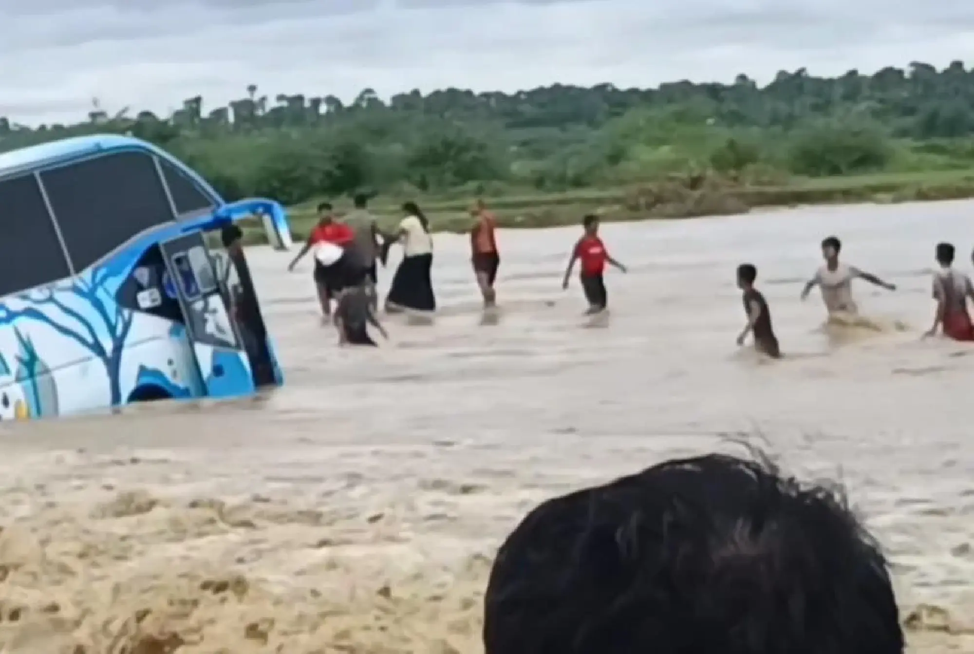 Passengers rescued after bus swept away by flooded creek in Mandalay Region