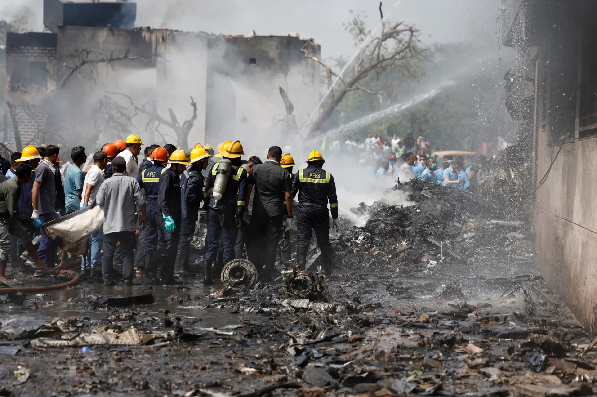 More than 100 killed as Air India plane with 242 on board crashes near Ahmedabad