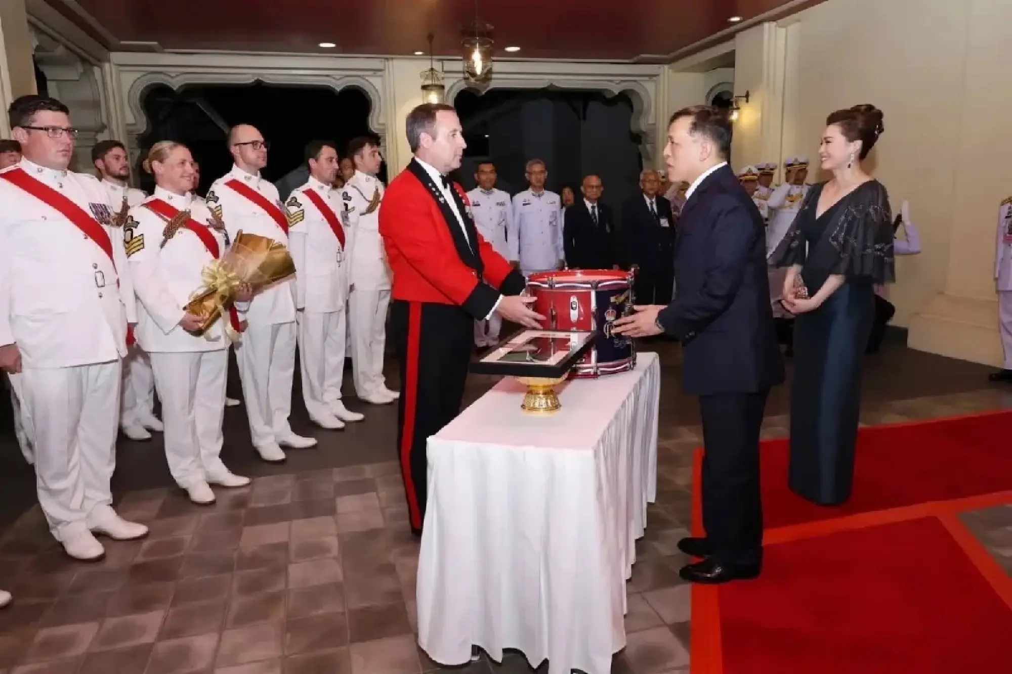 Their Majesties King and Queen attend Royal Marines Band Service performance