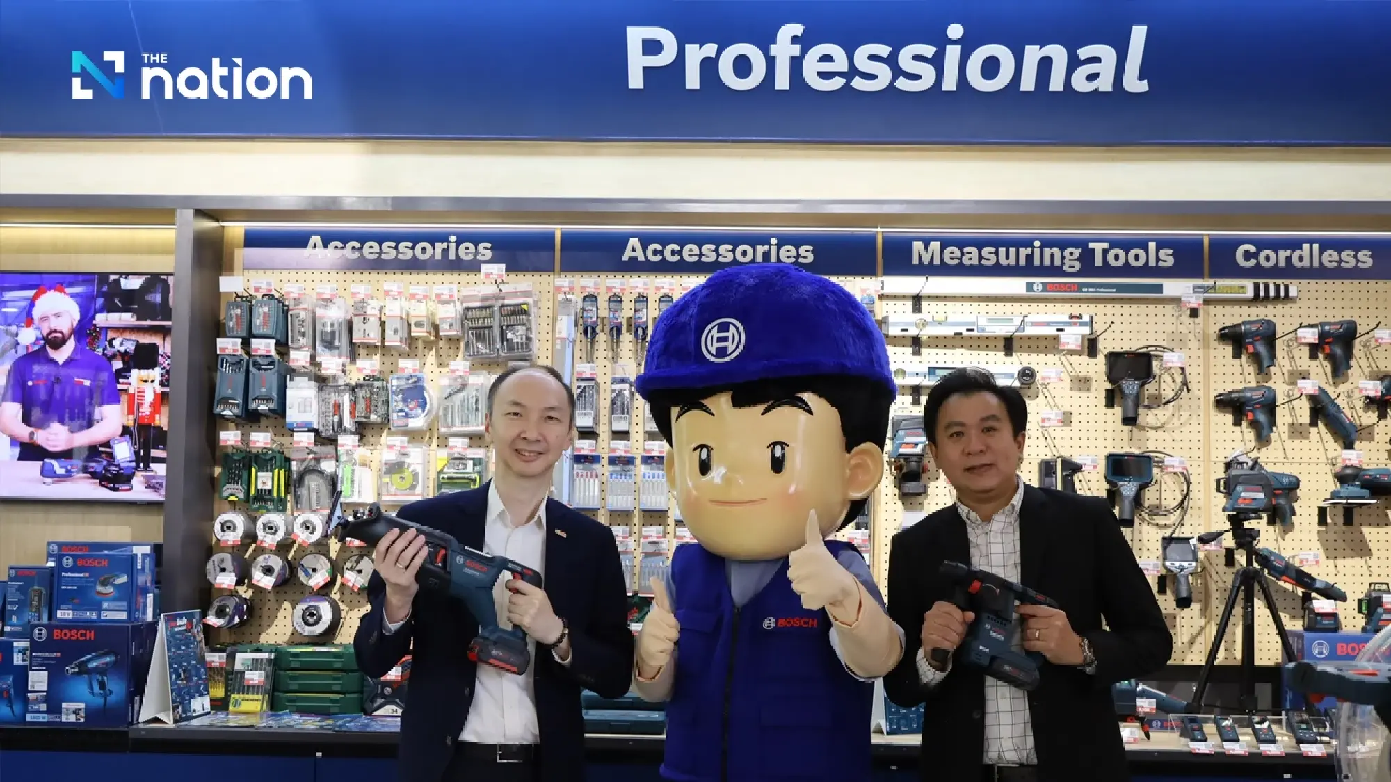 Joseph Hong, managing director, Bosch Thailand; Teerathas Prasertmetakul stand  with featured Bosch Power Tools—symbolizing the integrated product offering at the Bosch Living Studio.