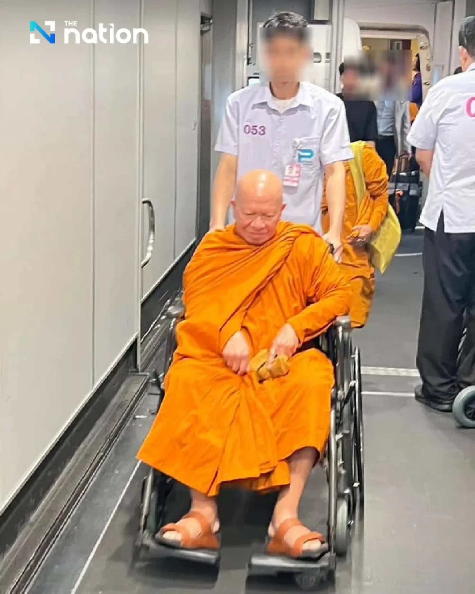 Former abbot of Bangkok temple returns from exile to face embezzlement charges
