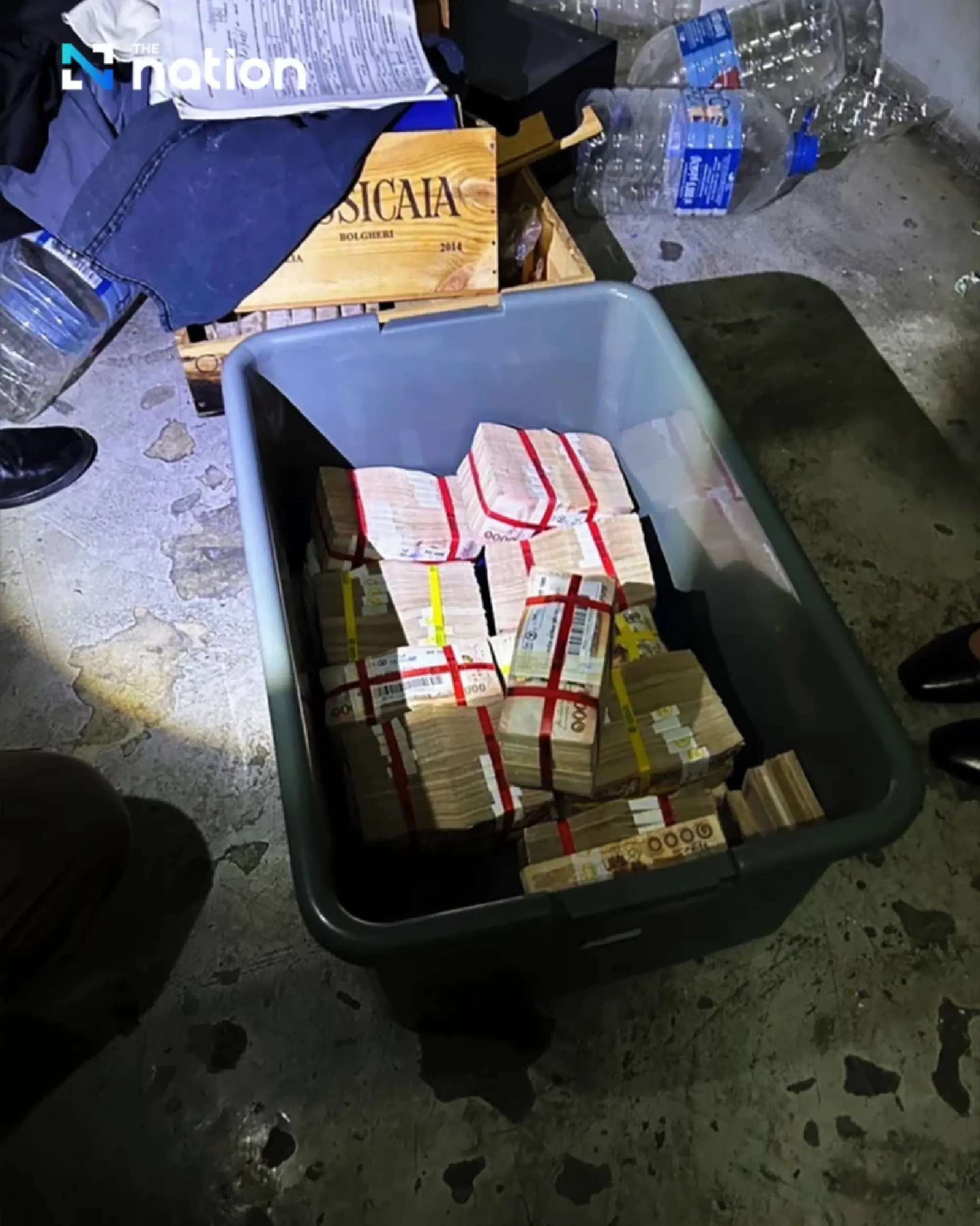 Man claims ownership of 12 million baht found in condo trash, says he stored the cash since 2020