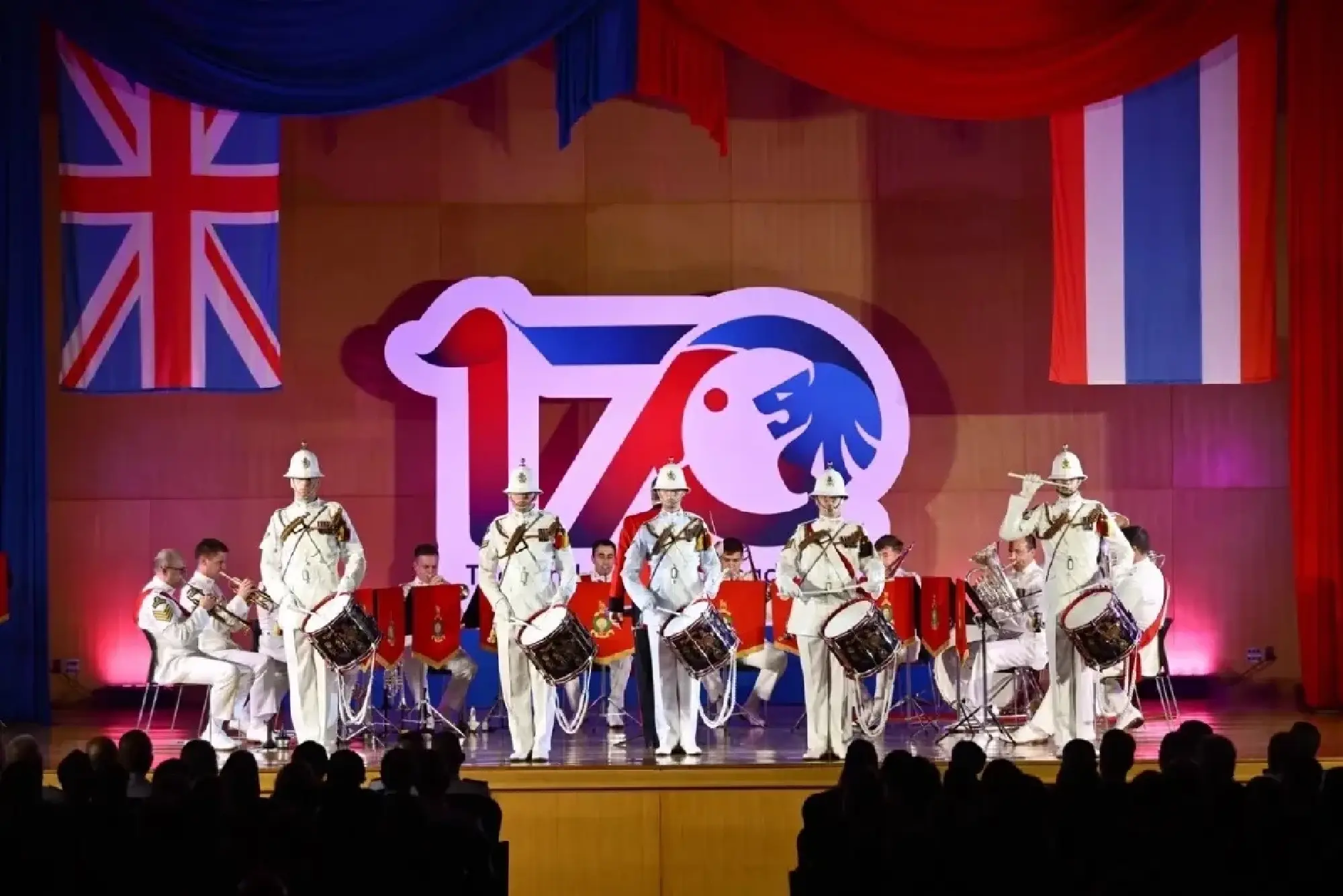 Their Majesties King and Queen attend Royal Marines Band Service performance