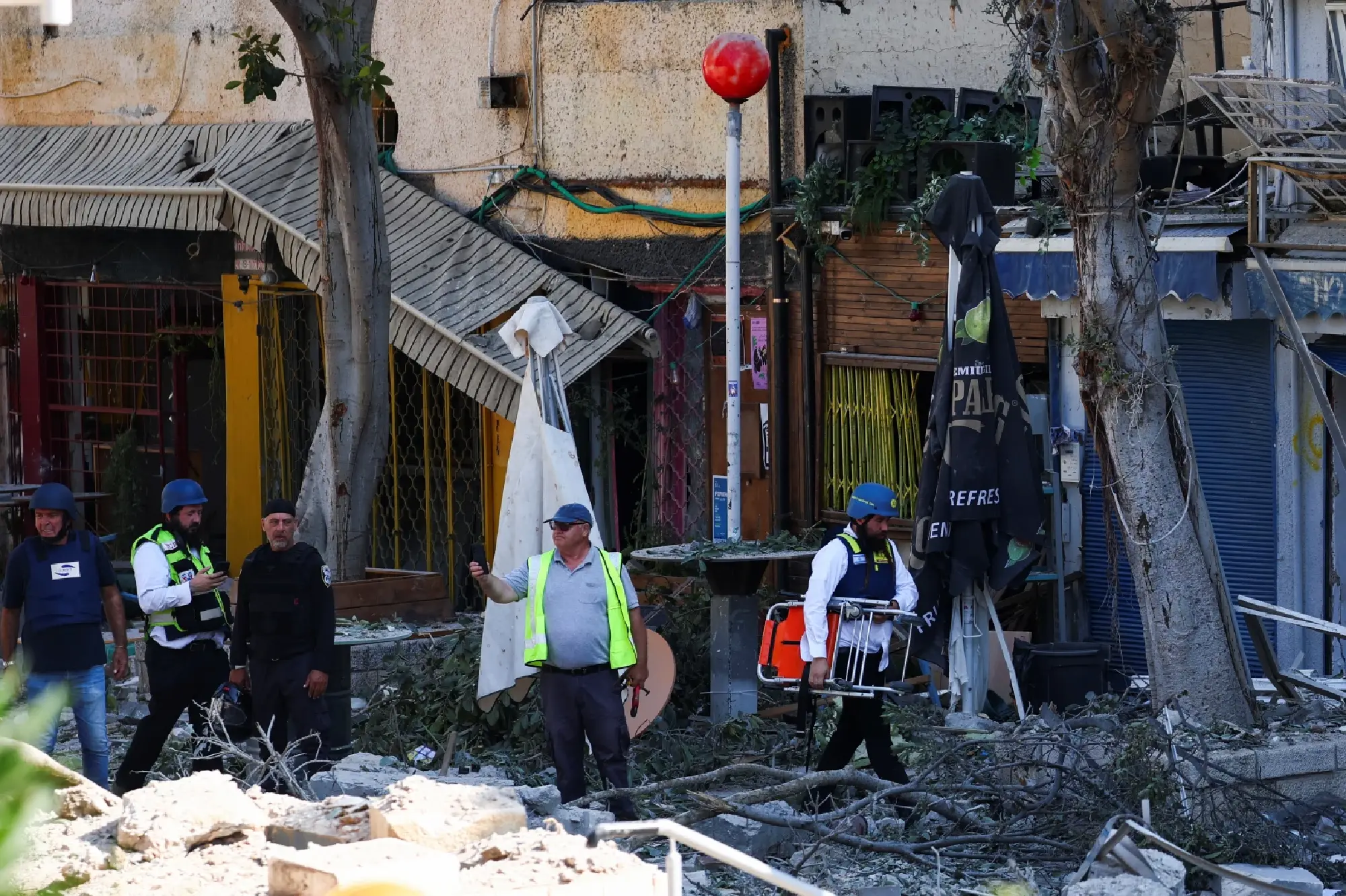 Israel under missile attack, Iran says all options open after US strikes