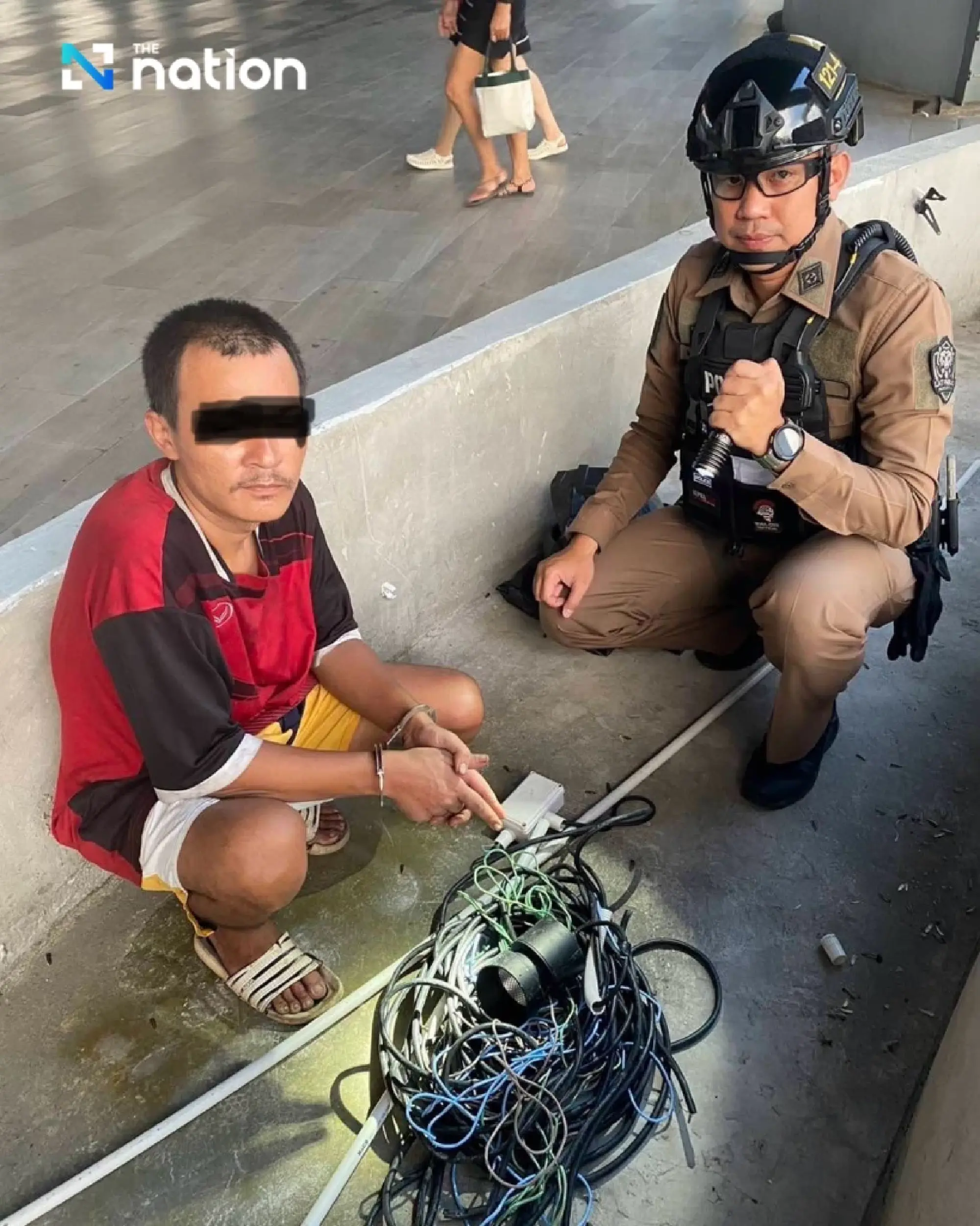 Cable Thief Apprehended on Bangkok Skywalk in Latest \'Shock the Thieves\' Operation