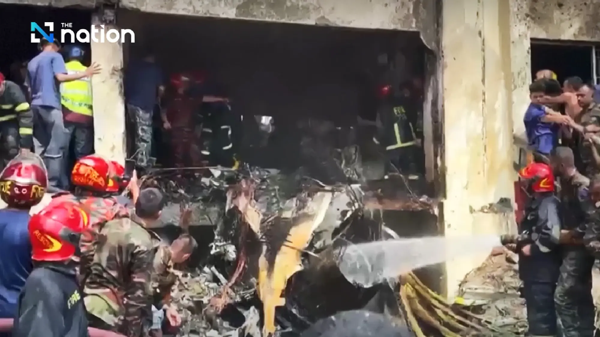 At least 19 killed, scores injured as Bangladesh air force jet crashes into college campus