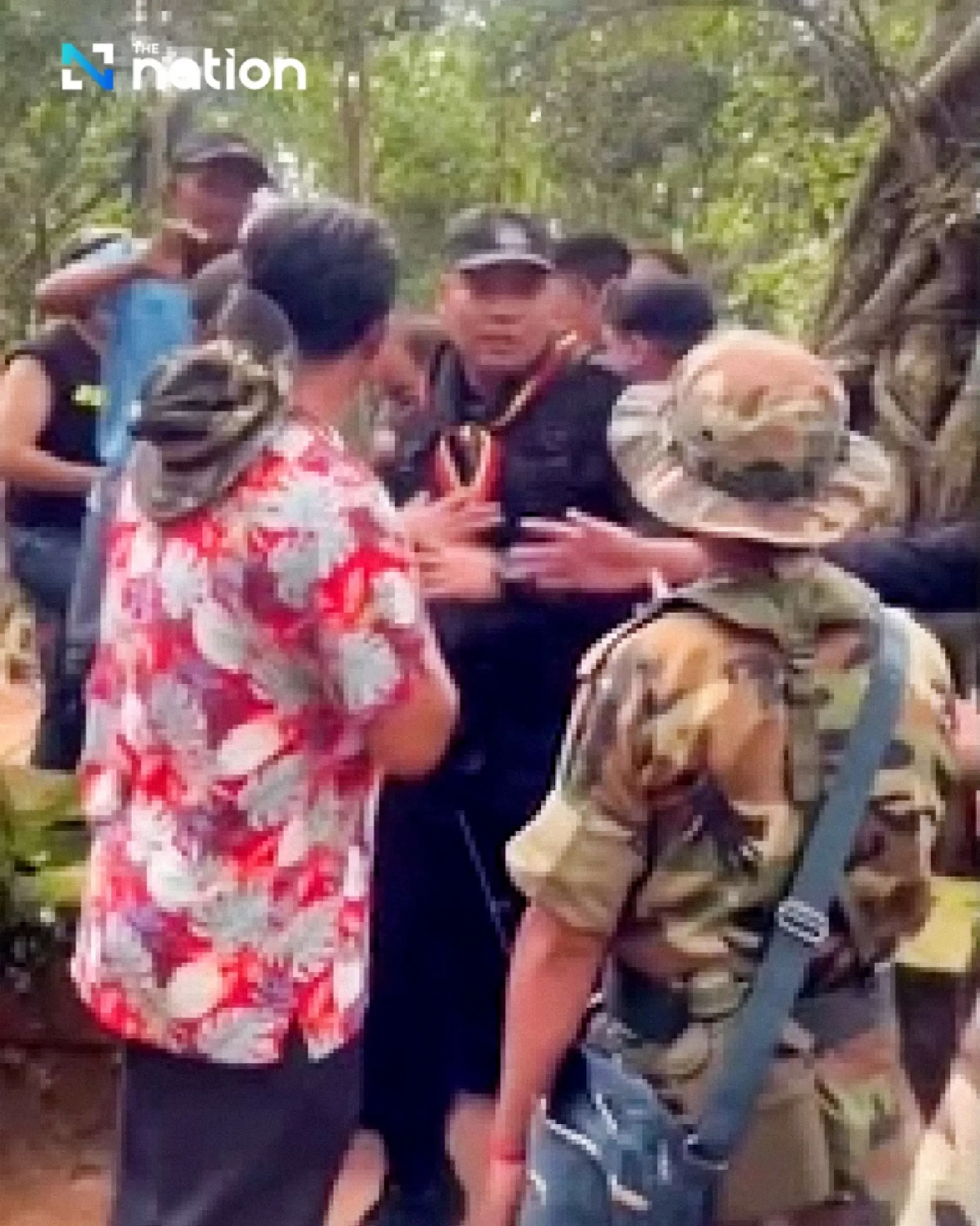 Cambodian woman carries national flag into Prasat Ta Khwai, nearly causes clash with Thais