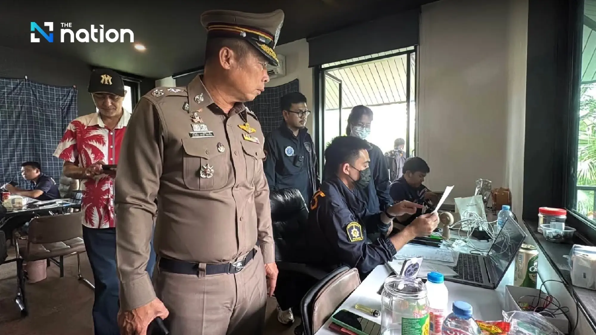 Police raid luxury mansion in Chiang Mai, arrest 18 Chinese call centre gang members