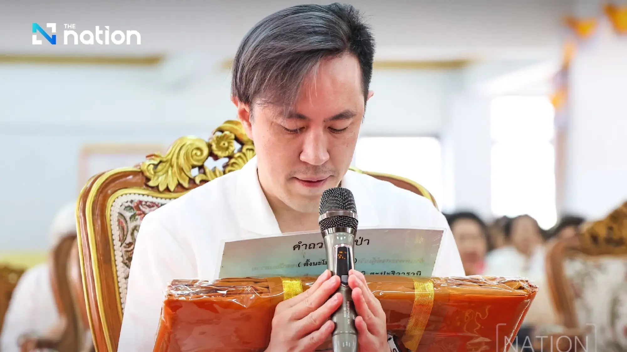 Shine Bunnag leads Nation Group executives in robe offering ceremony