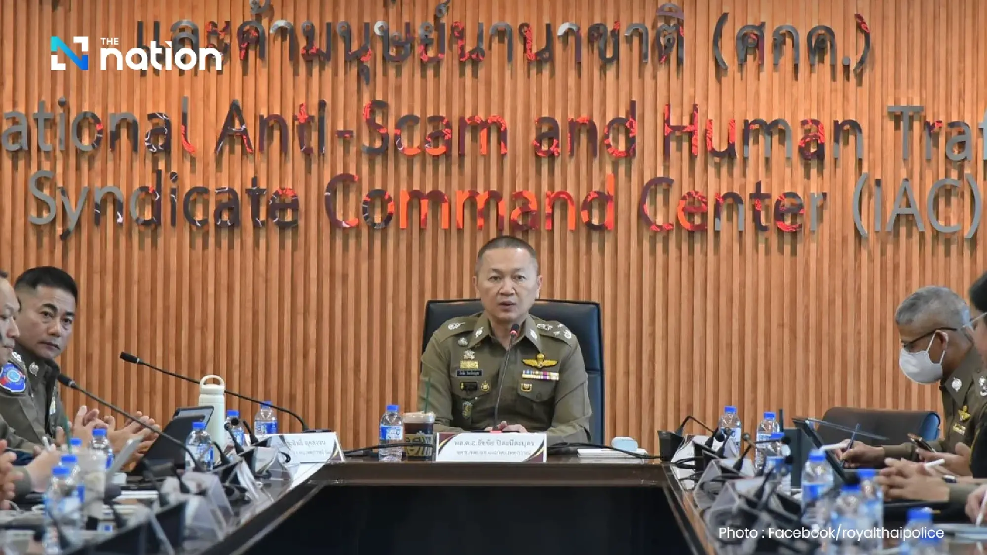 Pol Gen Thatchai Pitaneelaboot, inspector-general of the Royal Thai Police (centre)