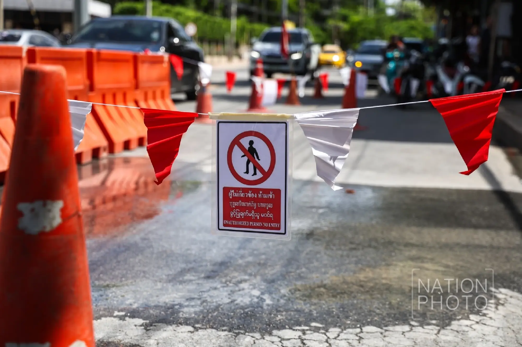Water seeping from Samsen Road near collapse site