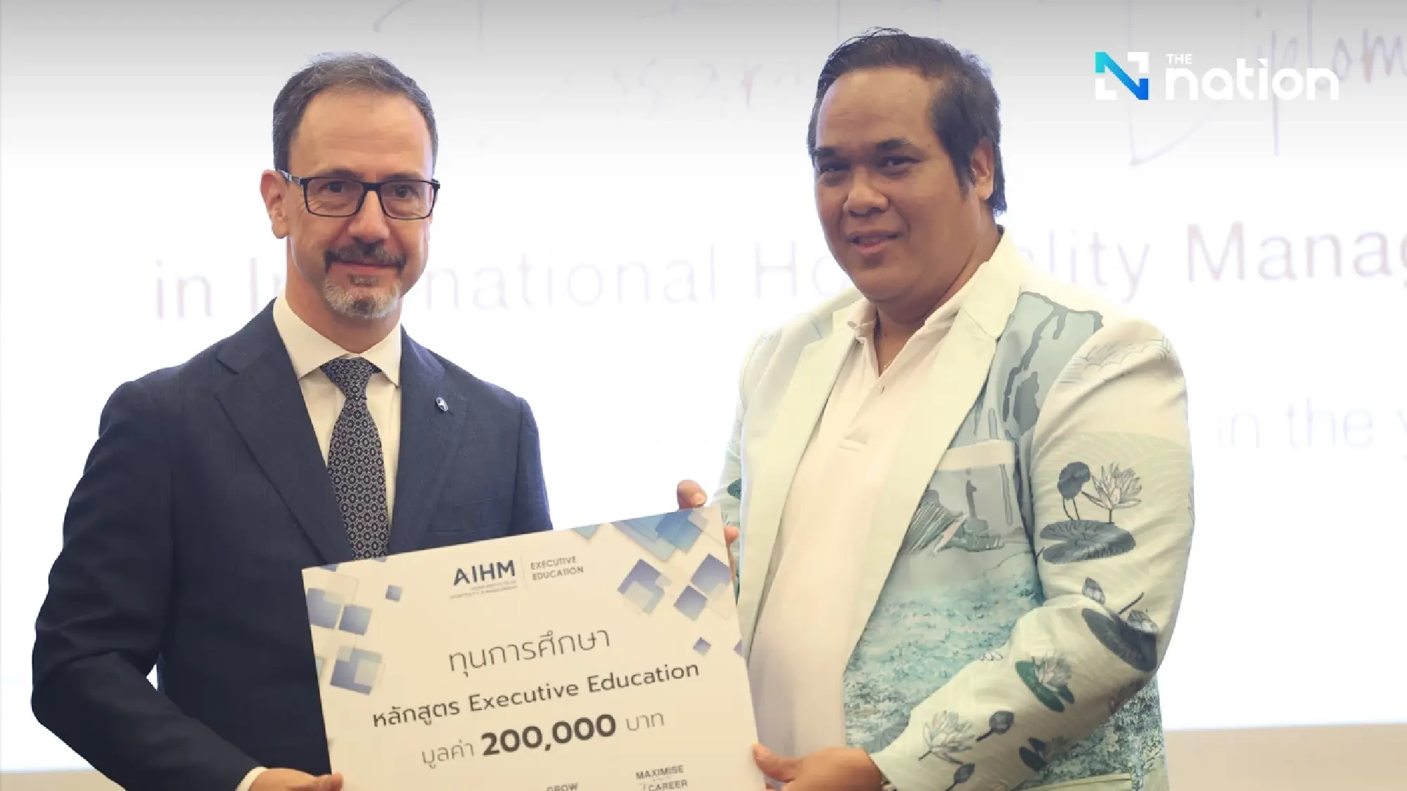 (from left) Chris Meylan and representative from Thailand's Ministry of Higher Education, Science, Research, and Innovation