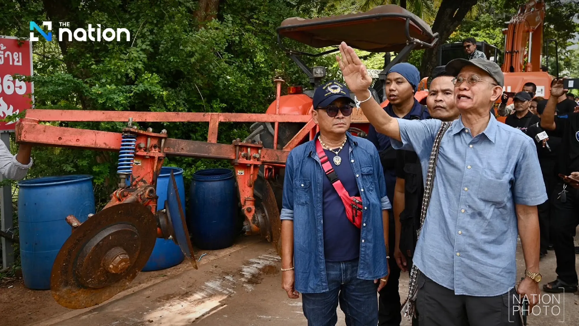 Activist Veera Somkwamkid, villagers gear up with excavator and tractors to reclaim Thai land 