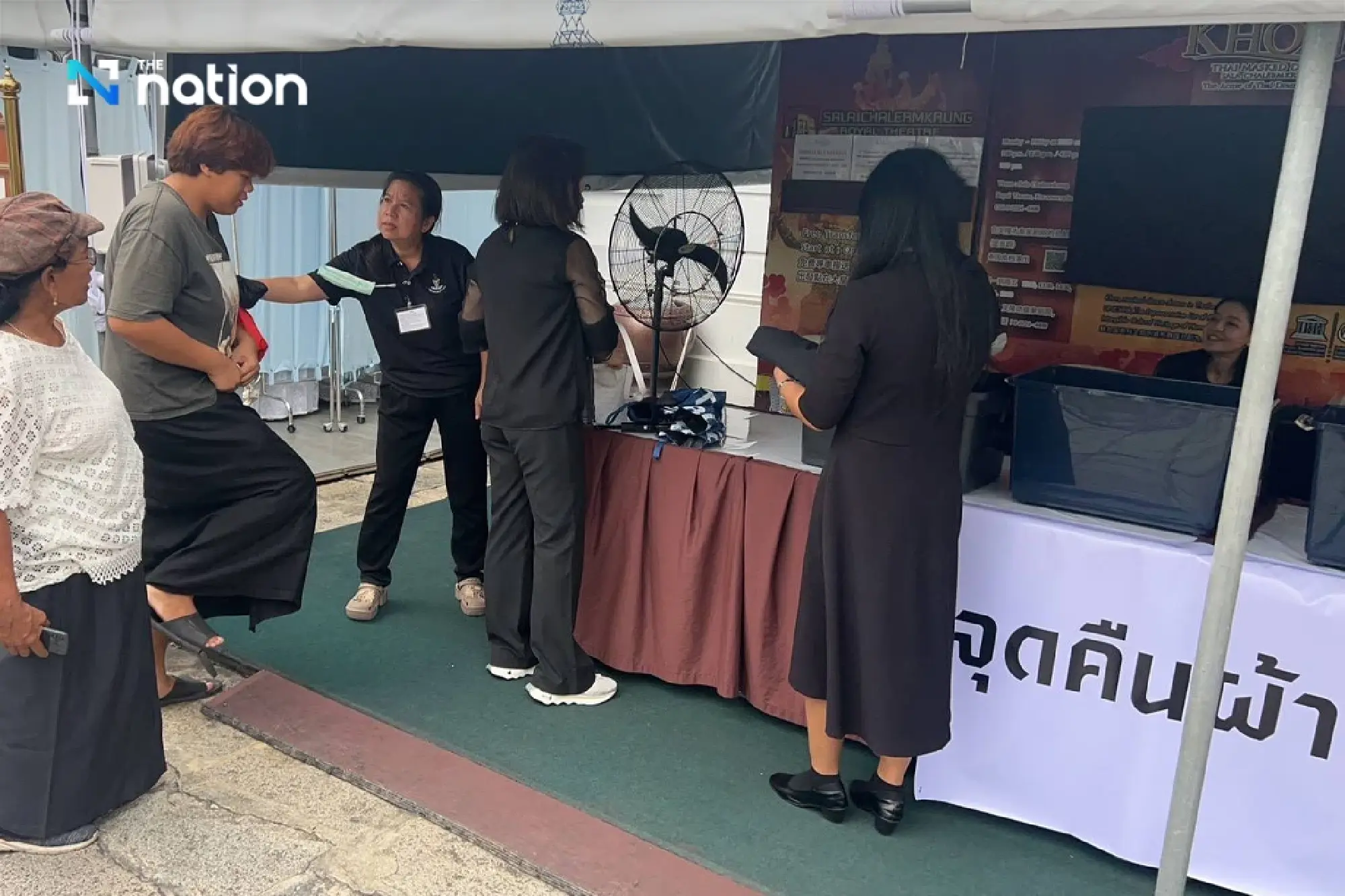 Free skirt rentals for mourners paying respects to the Queen Mother