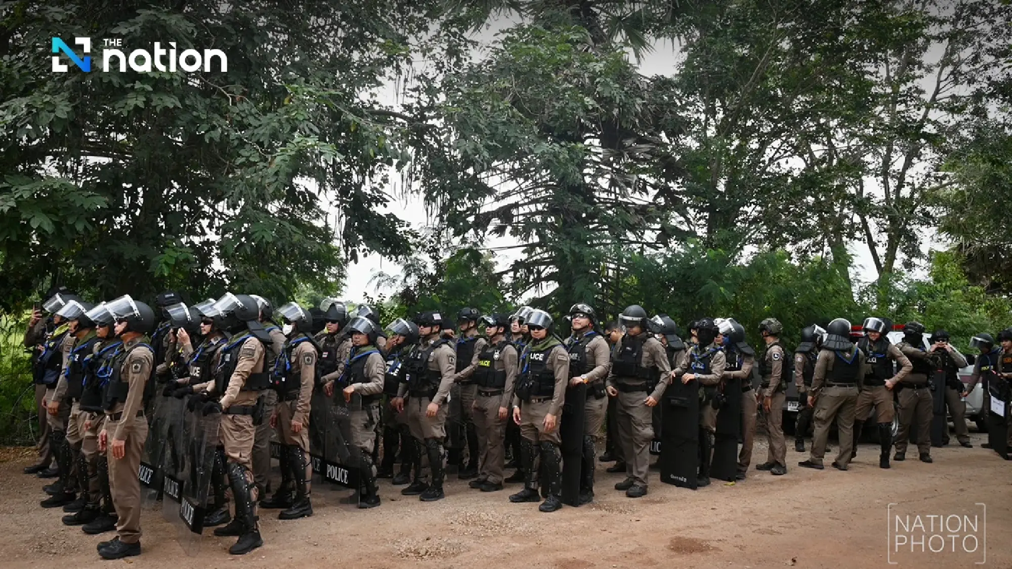Activist Veera Somkwamkid, villagers gear up with excavator and tractors to reclaim Thai land 