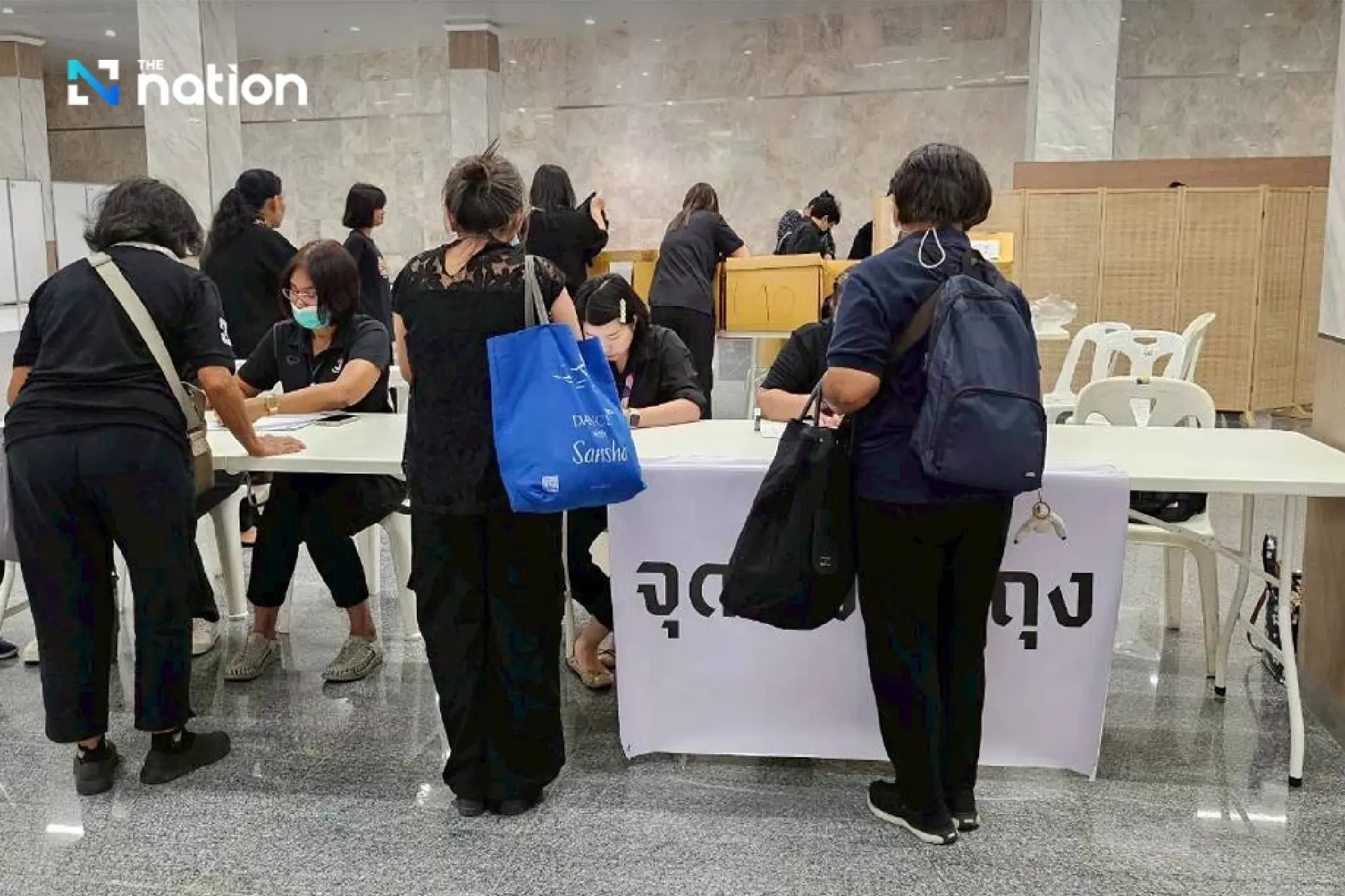 Free skirt rentals for mourners paying respects to the Queen Mother