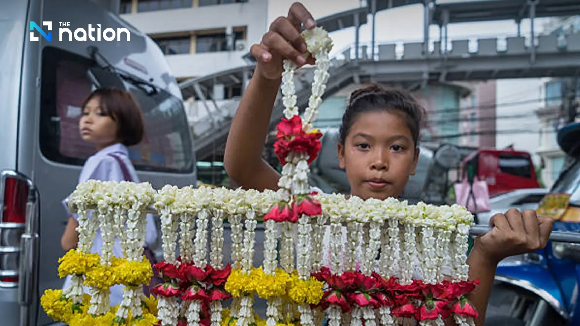 Why Thais sell flower garlands at red lights